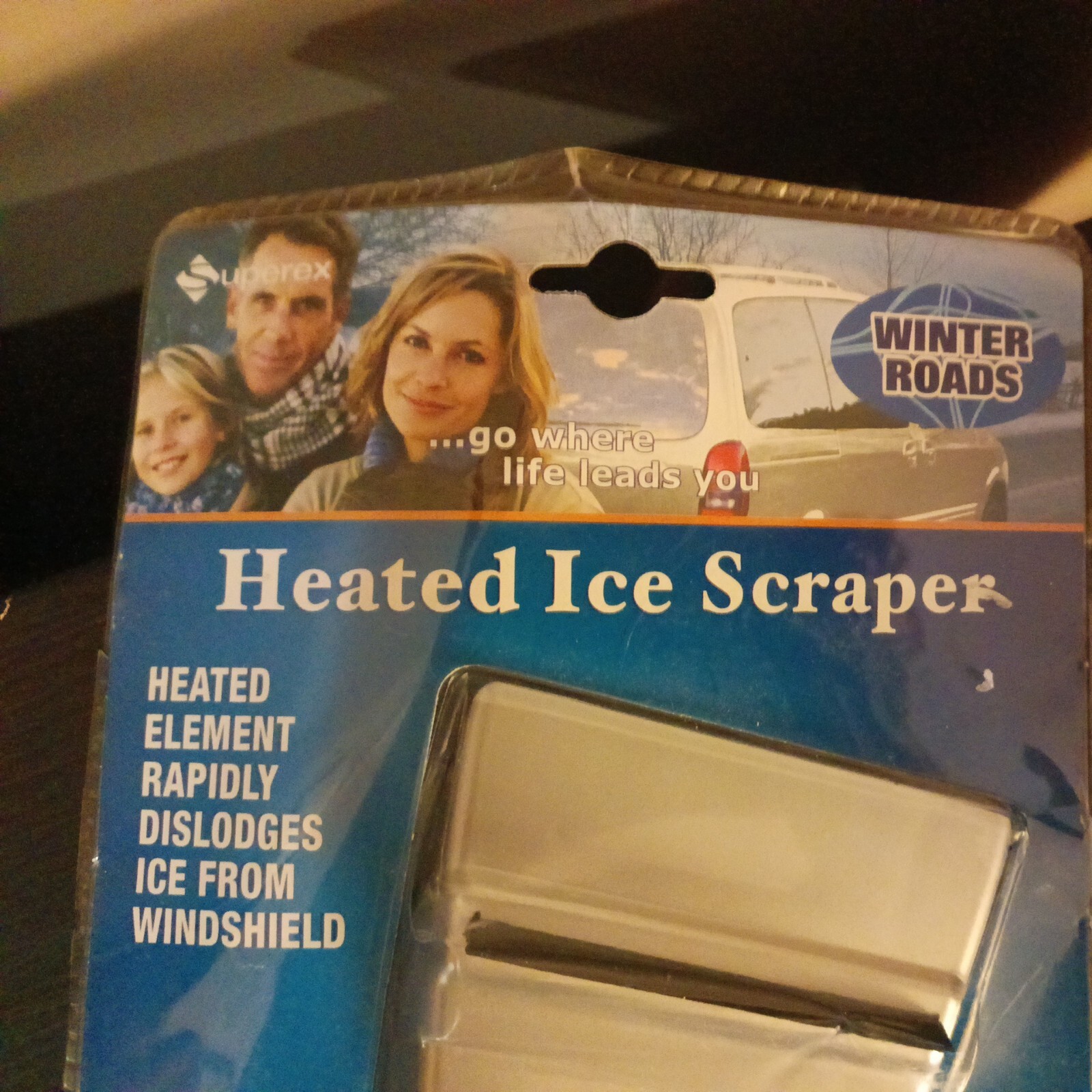 Heated Ice Scraper Rapidly Dislodges Ice Cream Windshield Nip