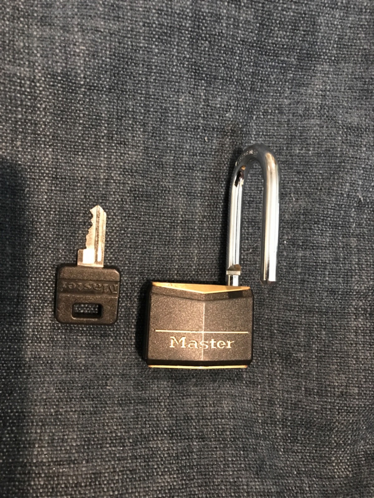 (1) Master Lock 141DLF Black Covered Solid Body Padlock, 1-1/2" Shackle, 1-9/16"