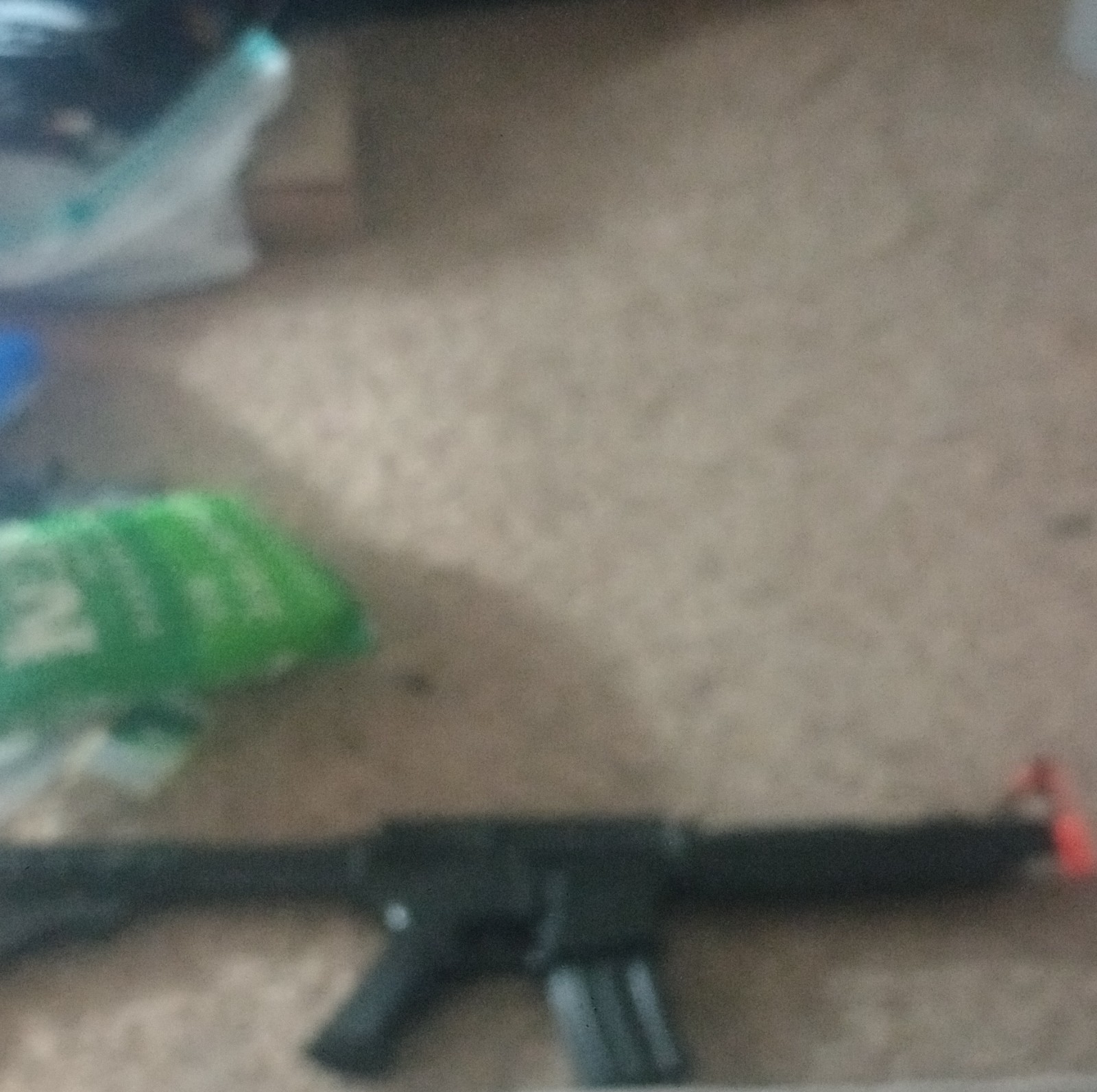 Electric Black Airsoft Rifle with Orange Tip