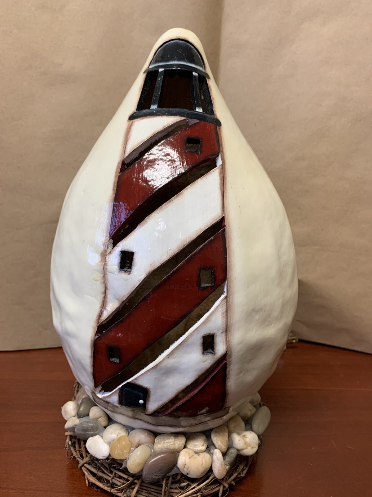 Light up Gourd W/Lighthouse Cut In And Painted On Front, Vine Wreath and rocks