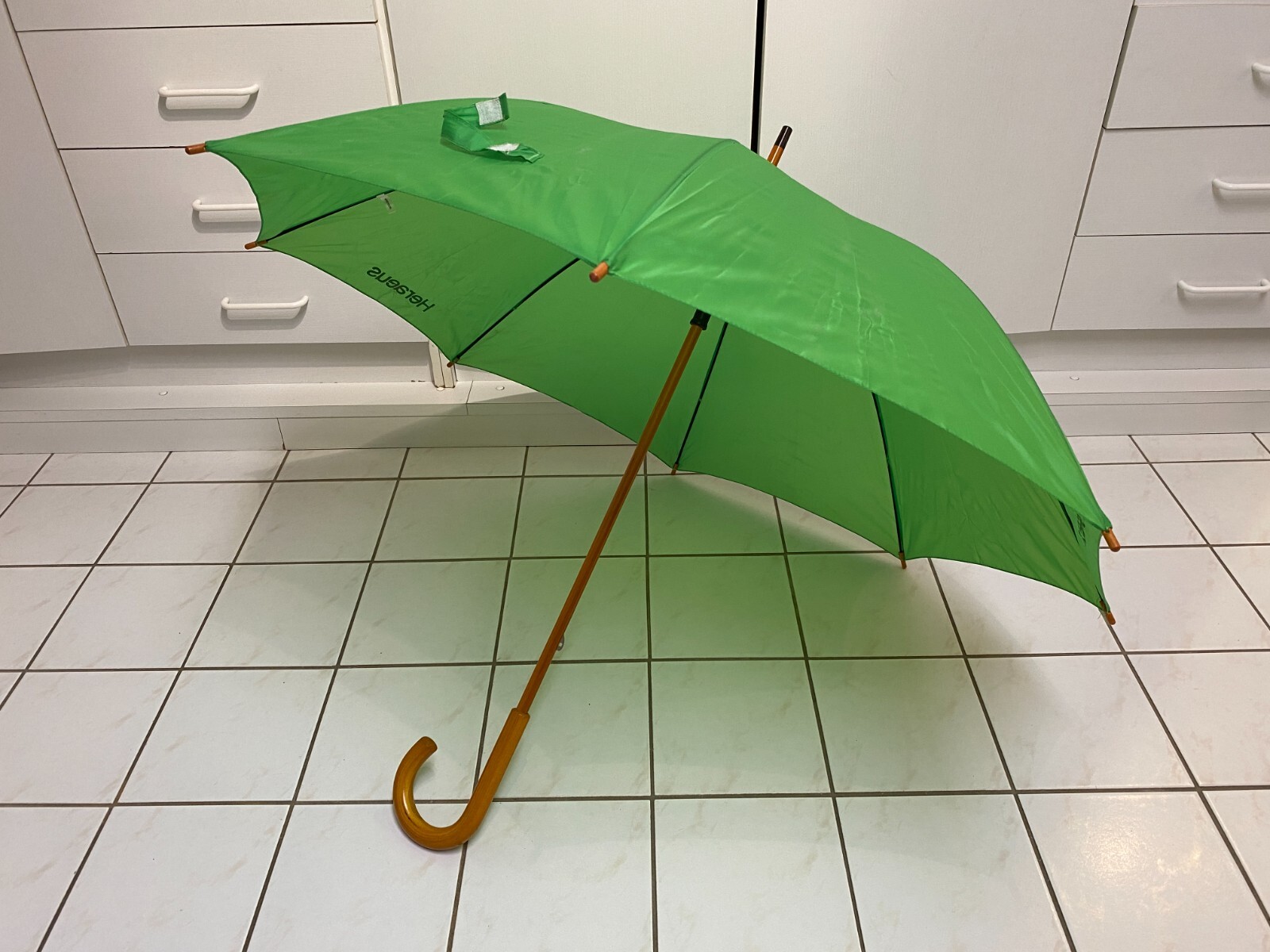 Umbrella, green with advertising print