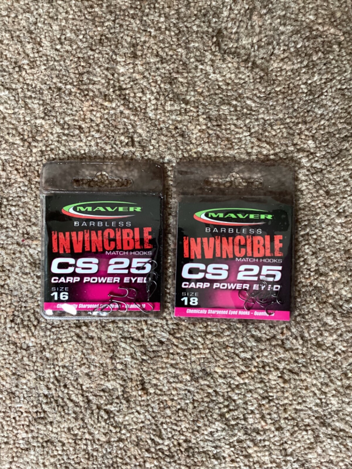 2 x packets of Maver Invincible CS25 eyed barbless hooks.  1 x size 16 1 x 18