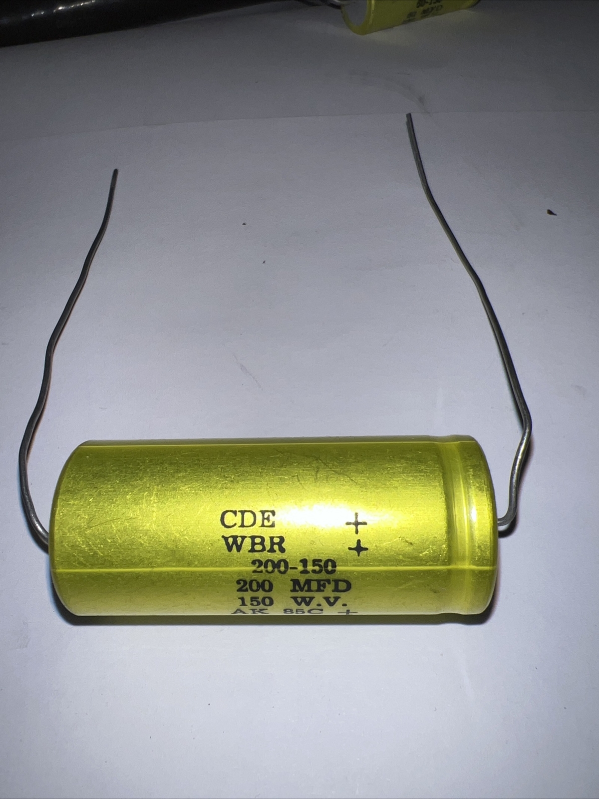 Electrolytic Capacitor 150 VDC 200 MFD 85°C ￼￼Axial Cornell CDE WBR .