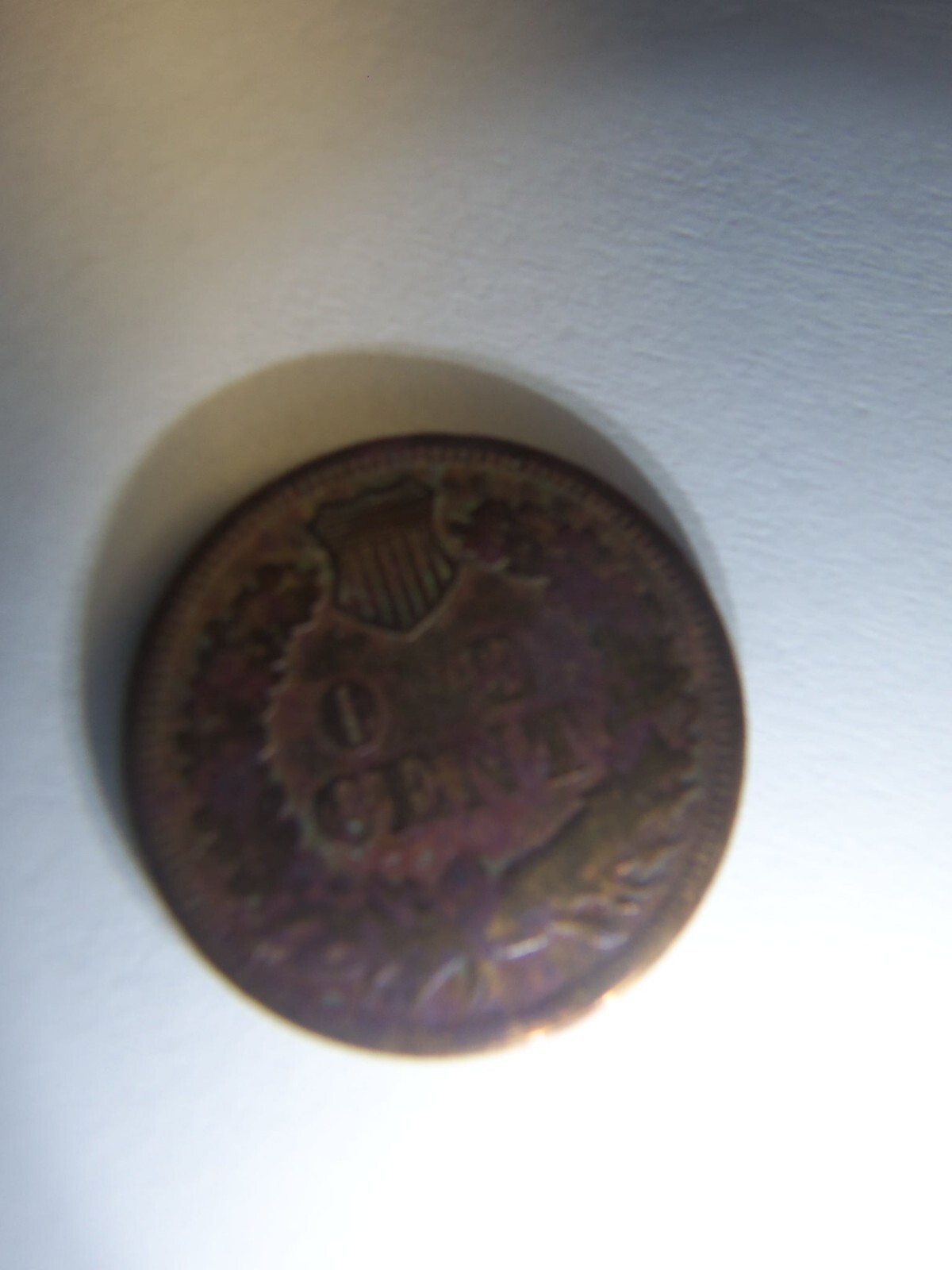 A RARE 1869 INDIAN HEAD PENNY