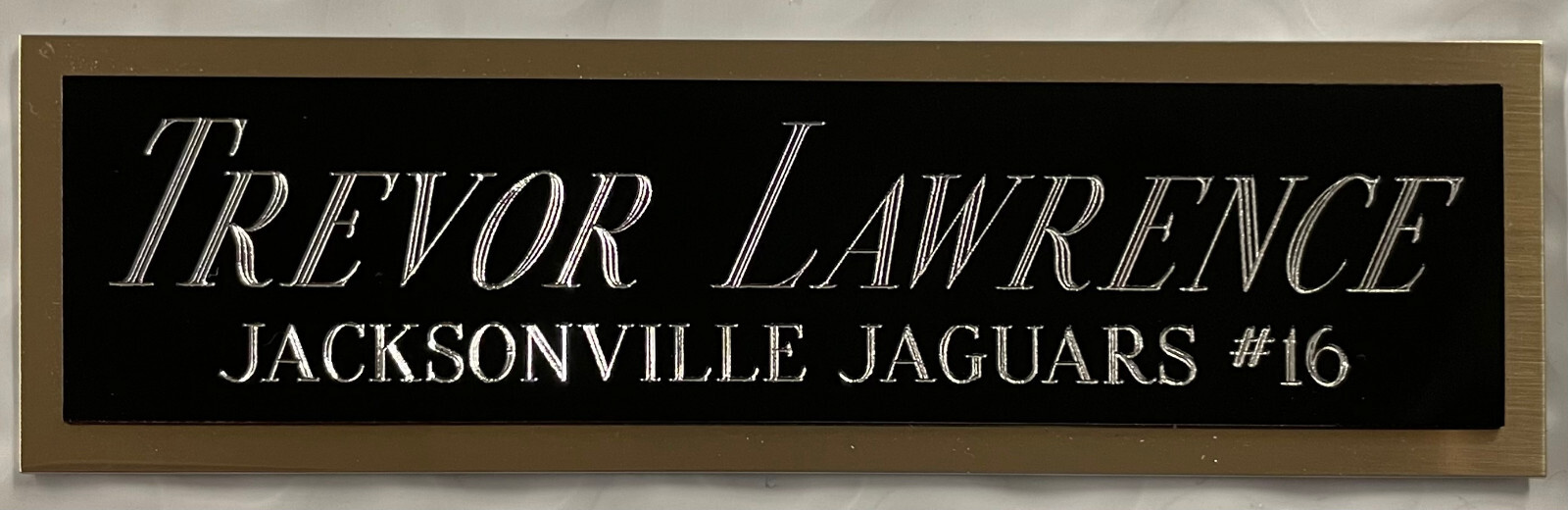 TREVOR LAWRENCE JACKSONVILLE JAGUARS NAMEPLATE AUTOGRAPH SIGNED FOOTBALL JERSEY
