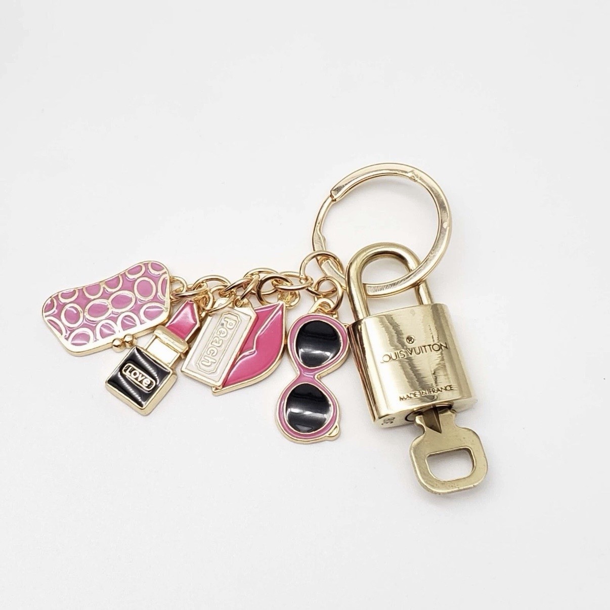 Authentic Louis Vuitton Lock & Key w/ Unbranded Bagcharm, Keychain