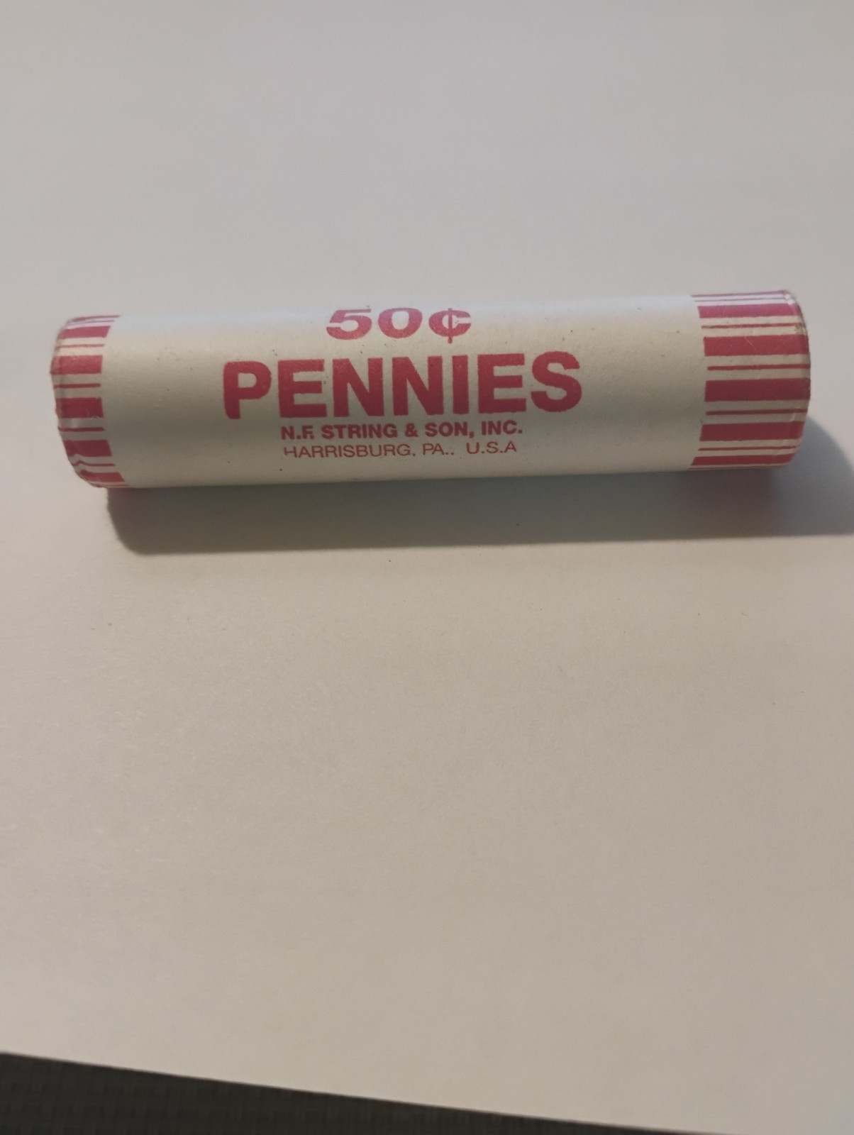 2010d uncirculated penny roll 50 coins per roll very shiny but have carbon spots