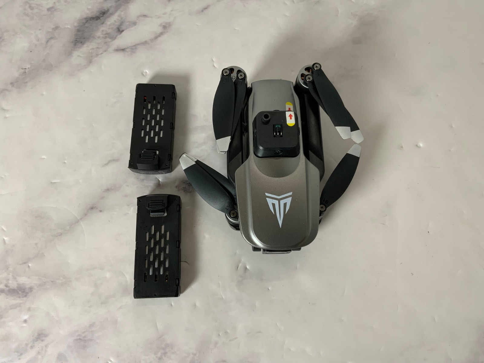 TizzyToy FPV Foldable Drone Quadcopter Silver-Brushless Camera App Control