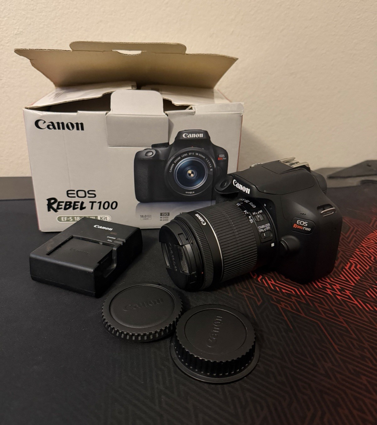 Canon EOS Rebel T100 DSLR 18MP w/ EF-S 18-55mm IS Lens, Box & Charger