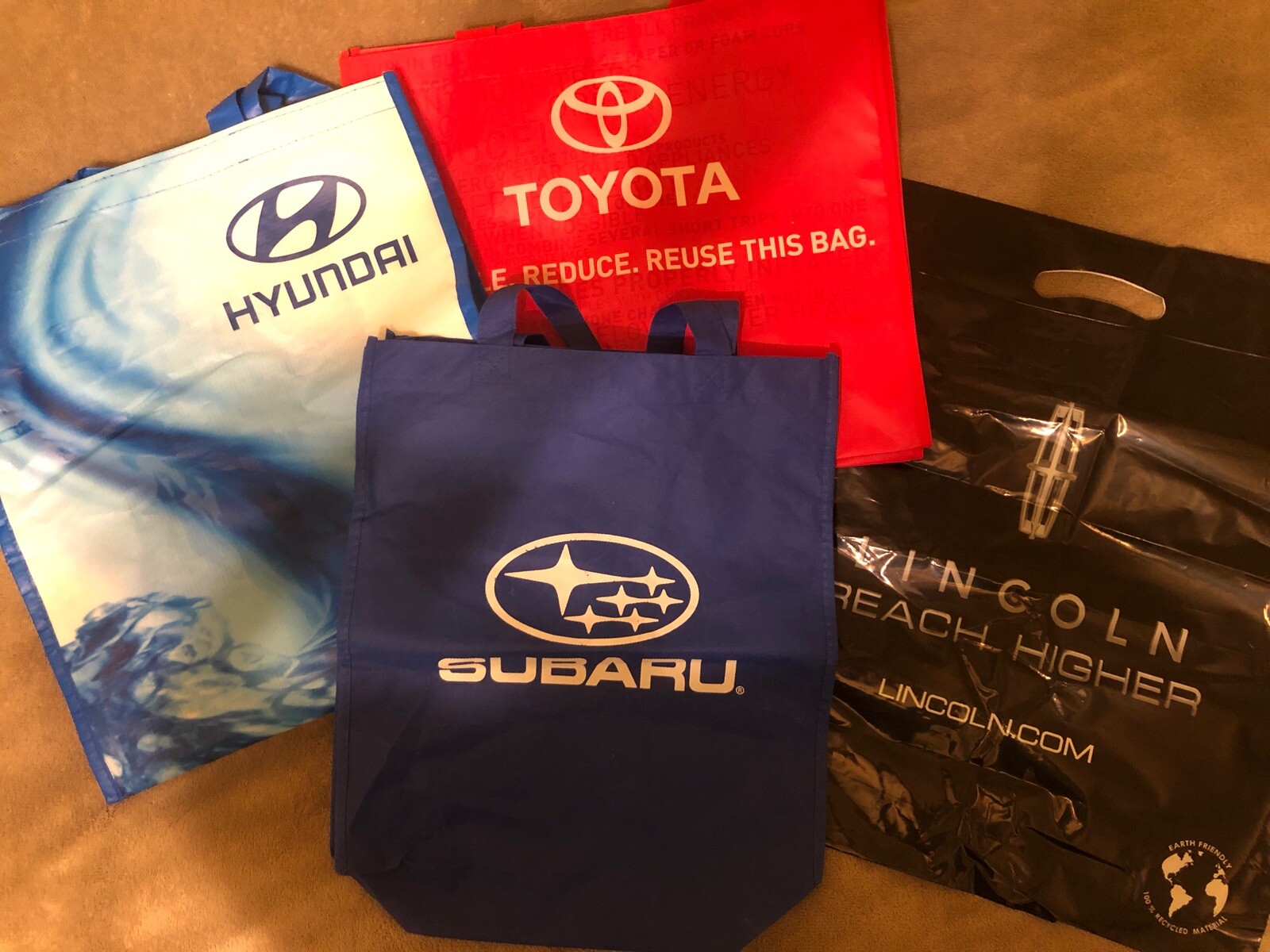 Lot of 4 Reusable Tote/Shopping bags: Subaru, Toyota, Hyundai, Lincoln
