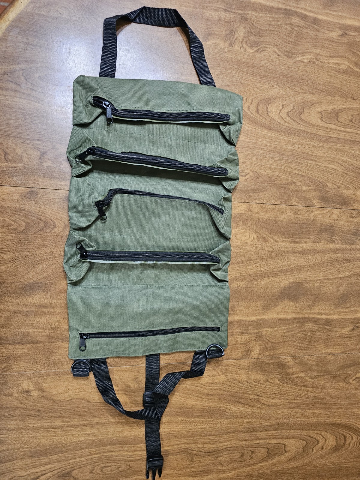 Green Military Surplus Gear Bag with Multiple Zippered Pockets and Straps