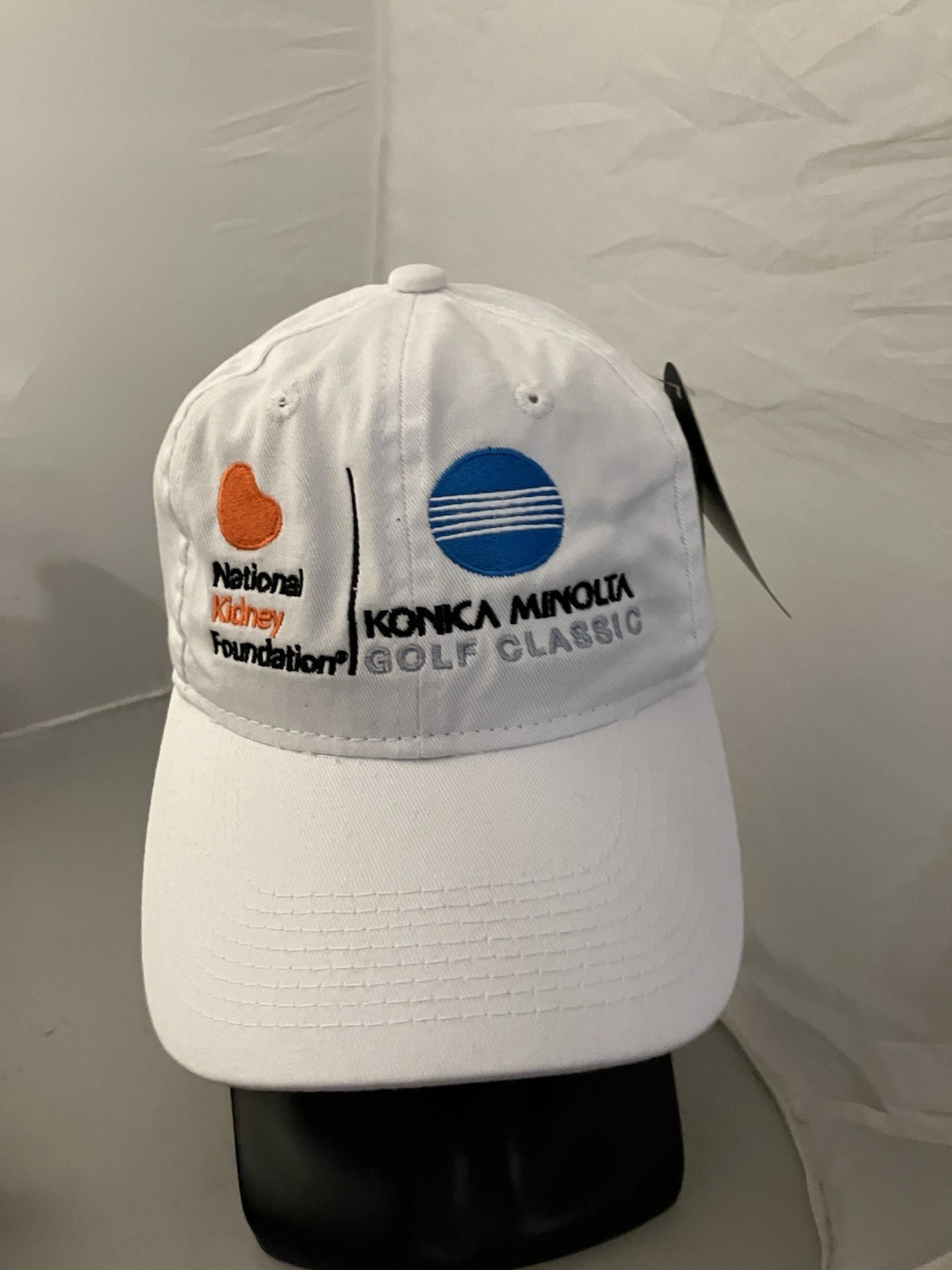 National Kidney Foundation Konica Minolta Greg Norman White Golf Cap Hat NWT