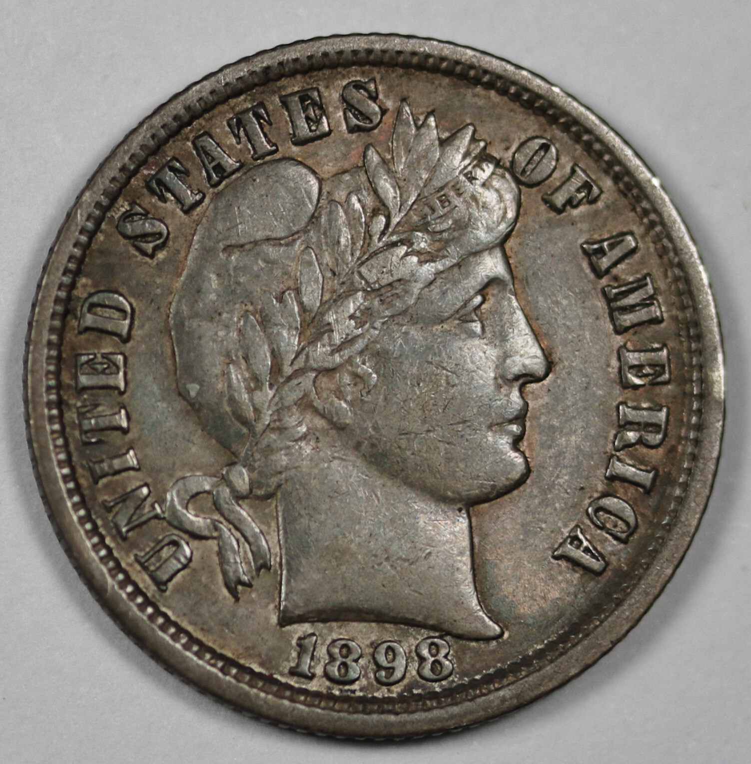 1898 Barber Dime.  Pretty Album Toning.  AU.  196868