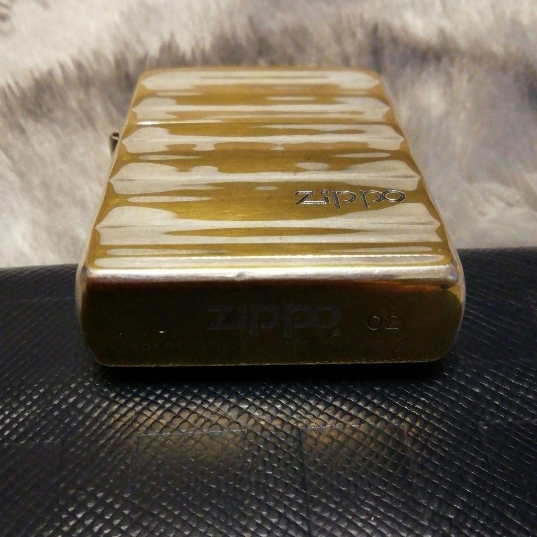 Zippo lighter, double-sided design, made in 2002.