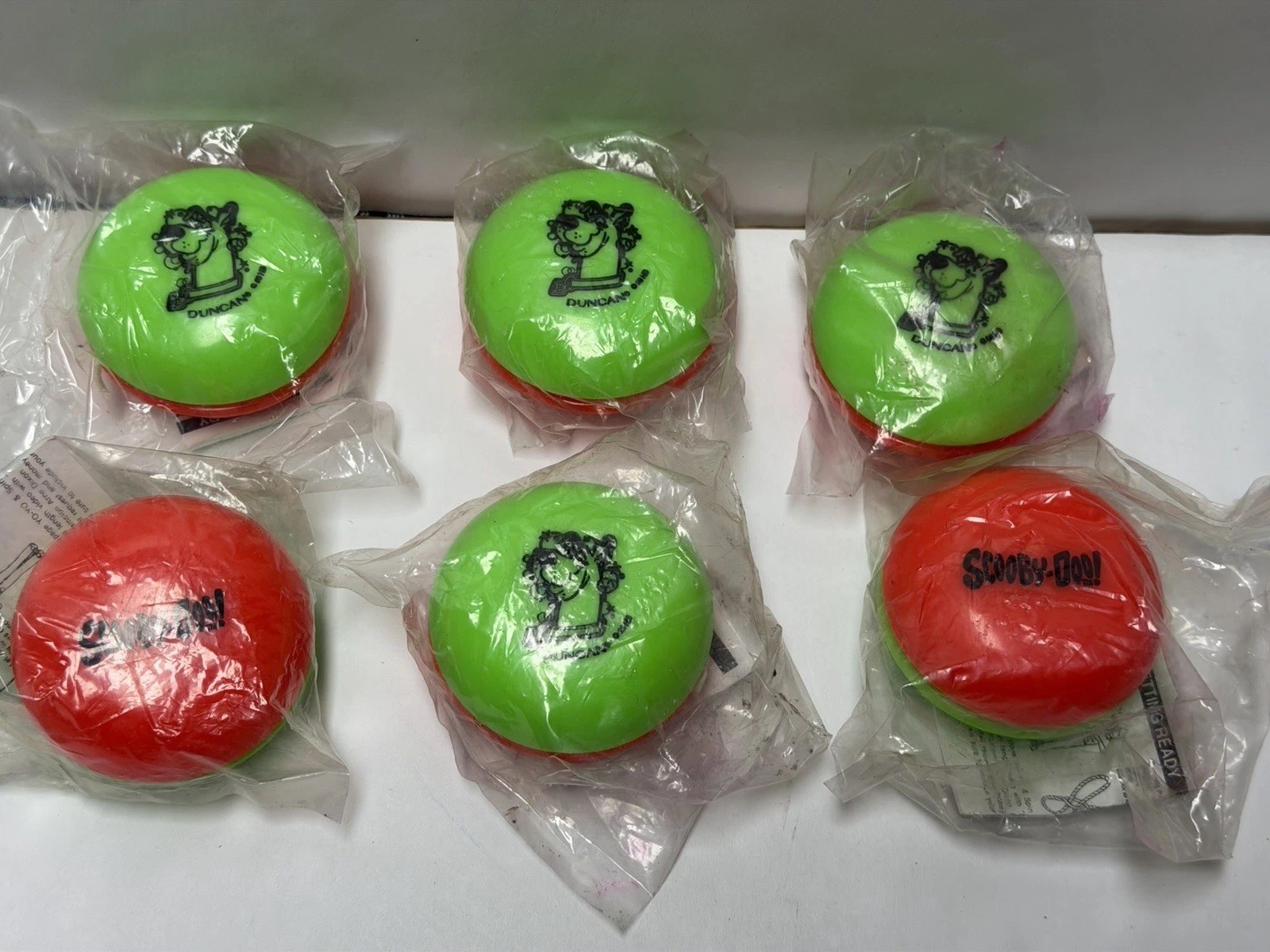 RARE 1992 VINTAGE SEALED DUNCAN SCOOBY DOO YO YO  LOT OF  6 NEON COLORED
