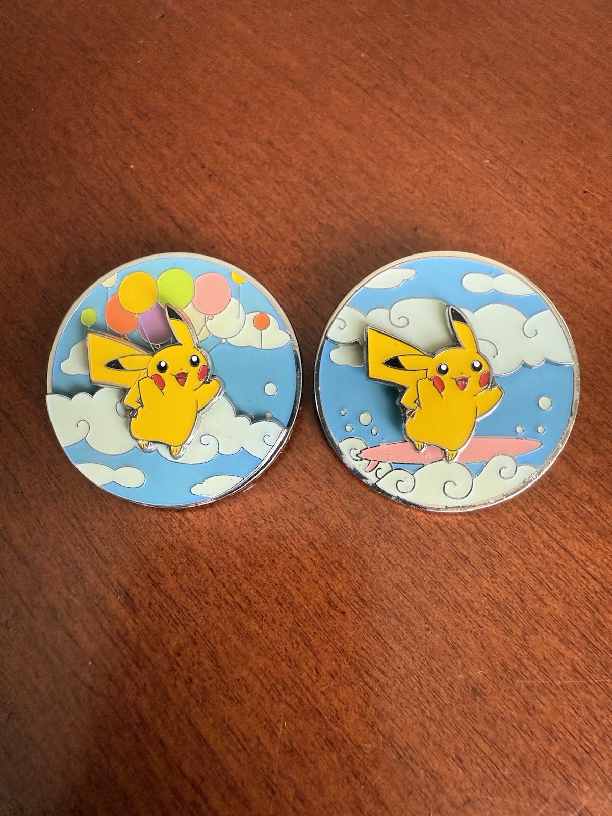 2 Pokemon Celebrations Deluxe, Flying & Surfing Pikachu Interactive Enamel Pins