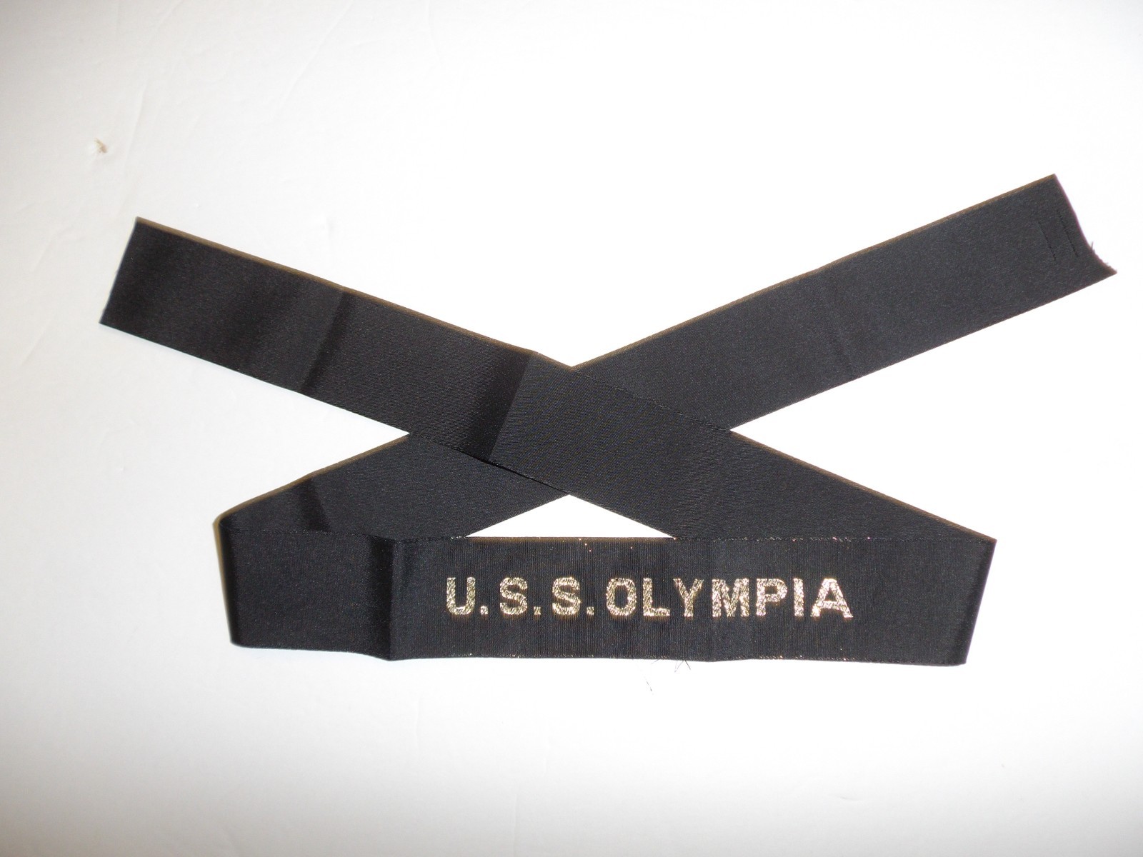 0538 USS Olympia Hat Tally US Navy IR31A