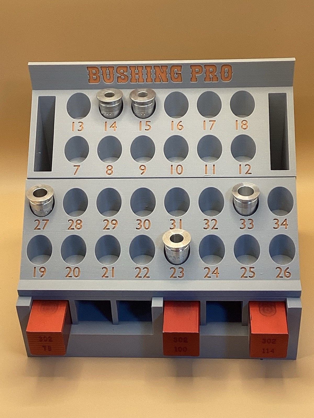 Modular Charge Bar and Powder Bushing Rack for All MEC Reloaders - Gray/Orange