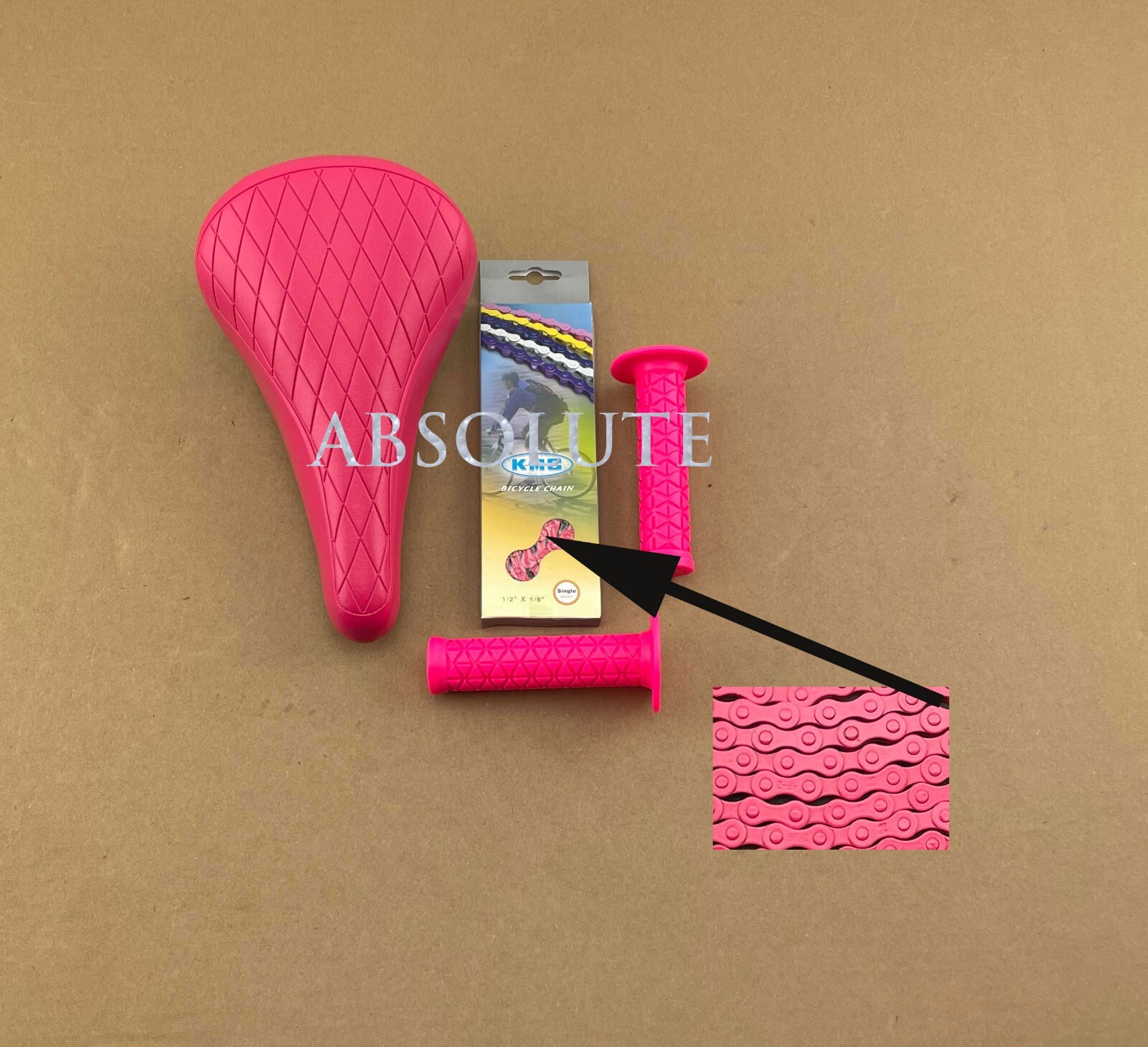 PINK DIAMOND STITCHED BMX BIKE SADDLE W/ BMX KMC CHAIN &TRIANGLE STYLE GRIPS.
