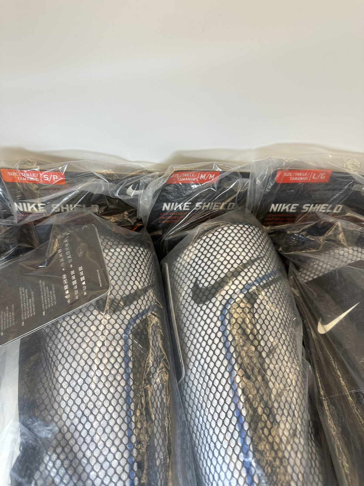Nike Soccer Shin Guards ALL SIZES – Protective Adjustable Straps, White/Blue