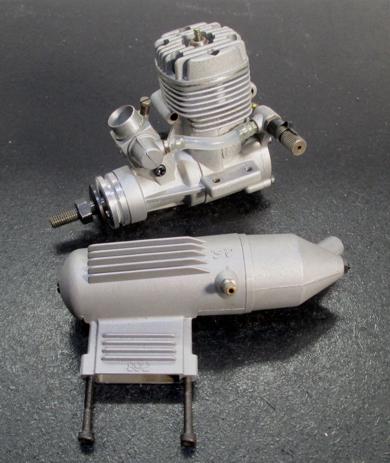 O.S. MAX-25FX 4.07cc 2-Stroke Glow Engine Includes muffler; used for RC airplane