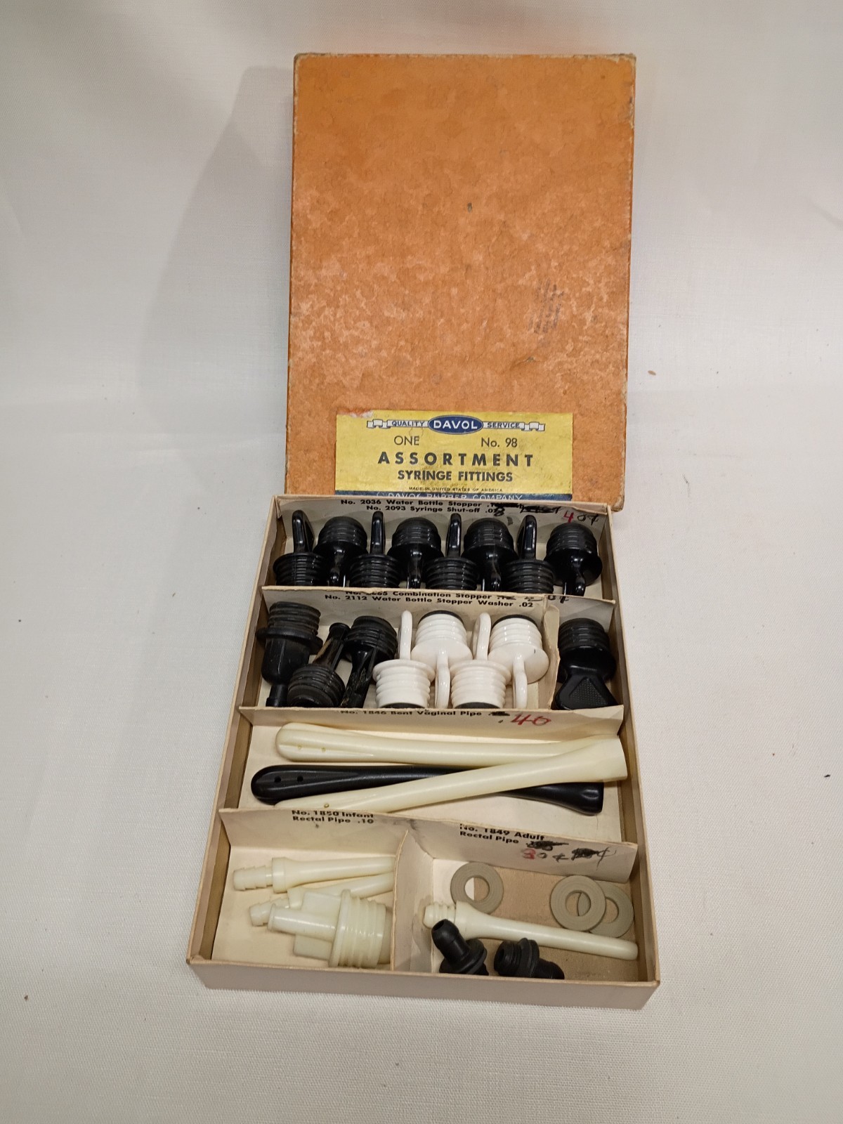 Vintage Davol Assortment of Syringe Fittings No. 98, (6) nozzles, (17) stoppers