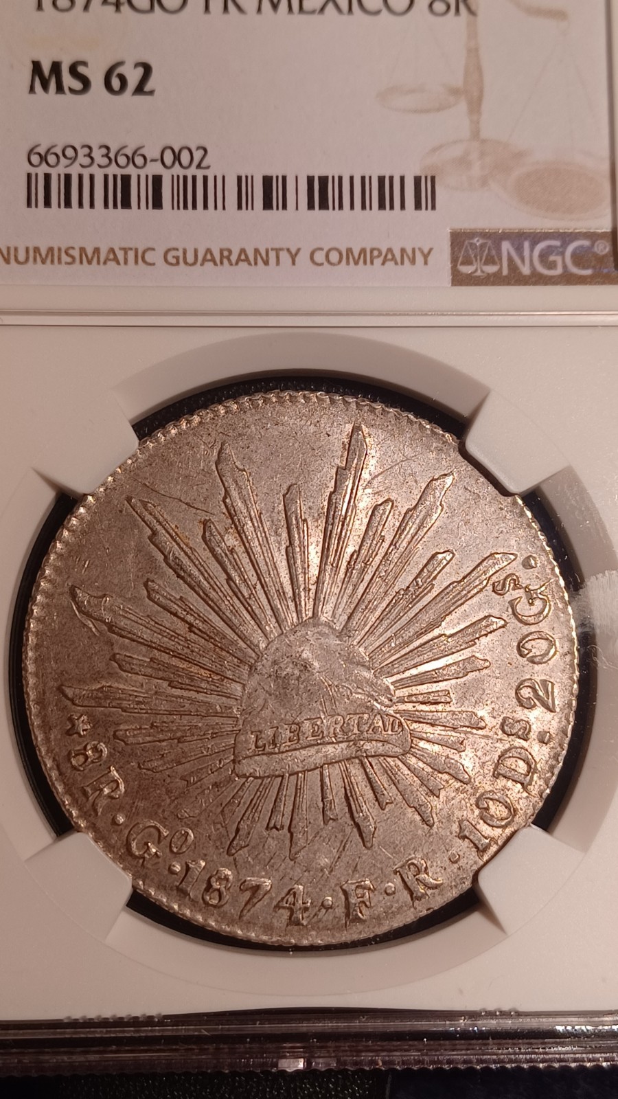 A* 1874 GO FR Mexico NGC MS62 8 Reales Peso Silver Scarce UNC  & NGC website