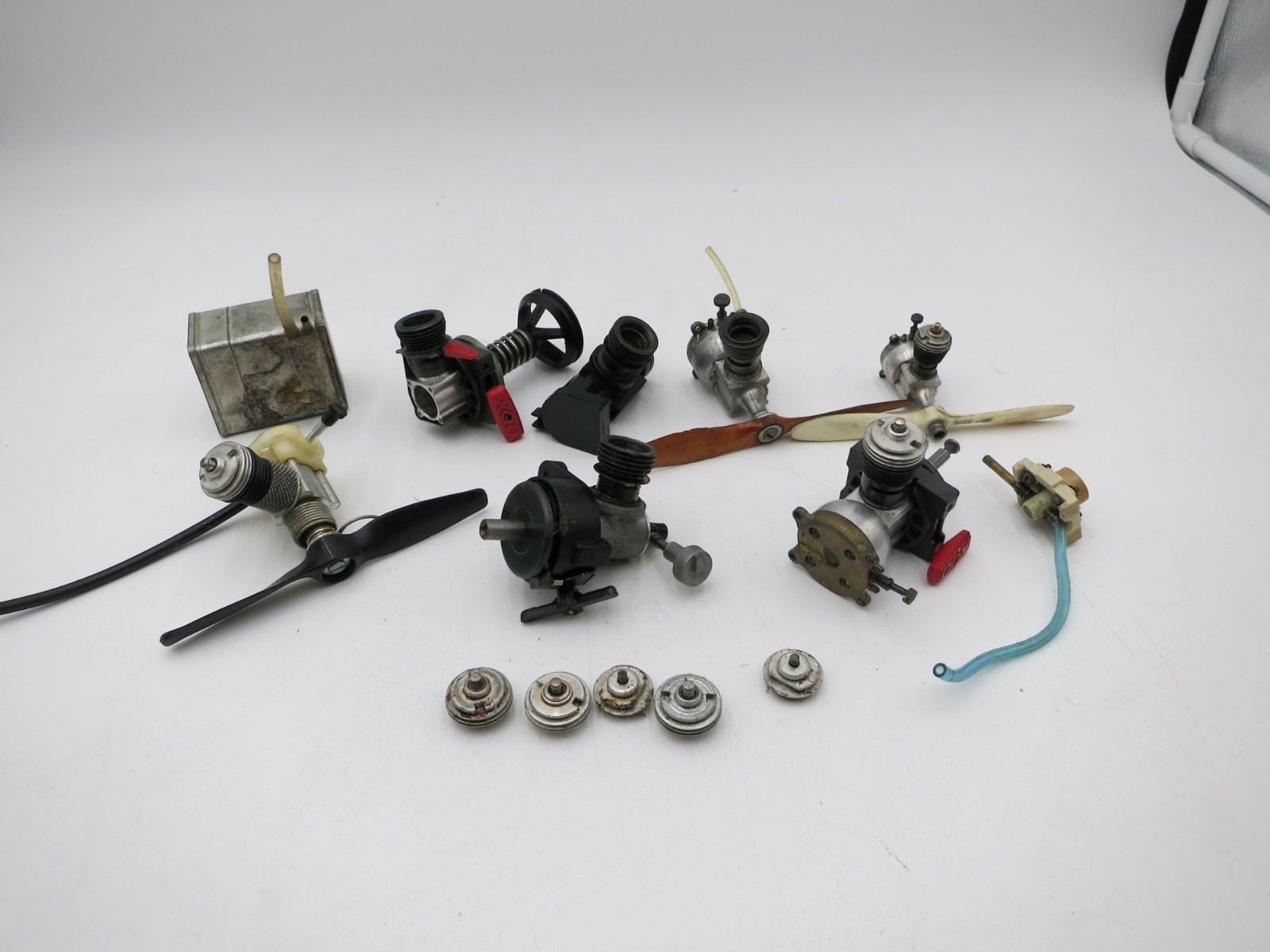 VINTAGE COX AIRPLANE ENGINE LOT OF 7 PLUS 1 FUEL TANK FOR PARTS OR REPAIR MODEL