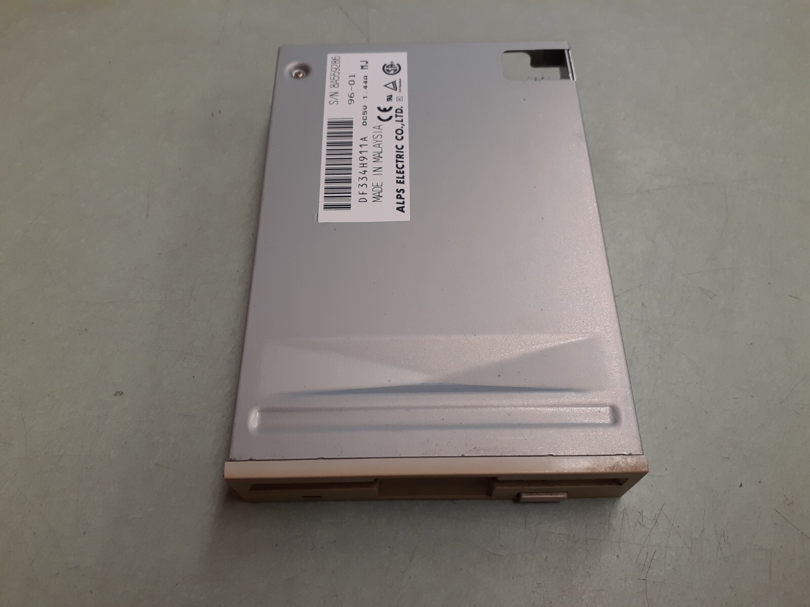 Alps Electric DF334H911A 3.5 Floppy Drive - Beige Bezel
