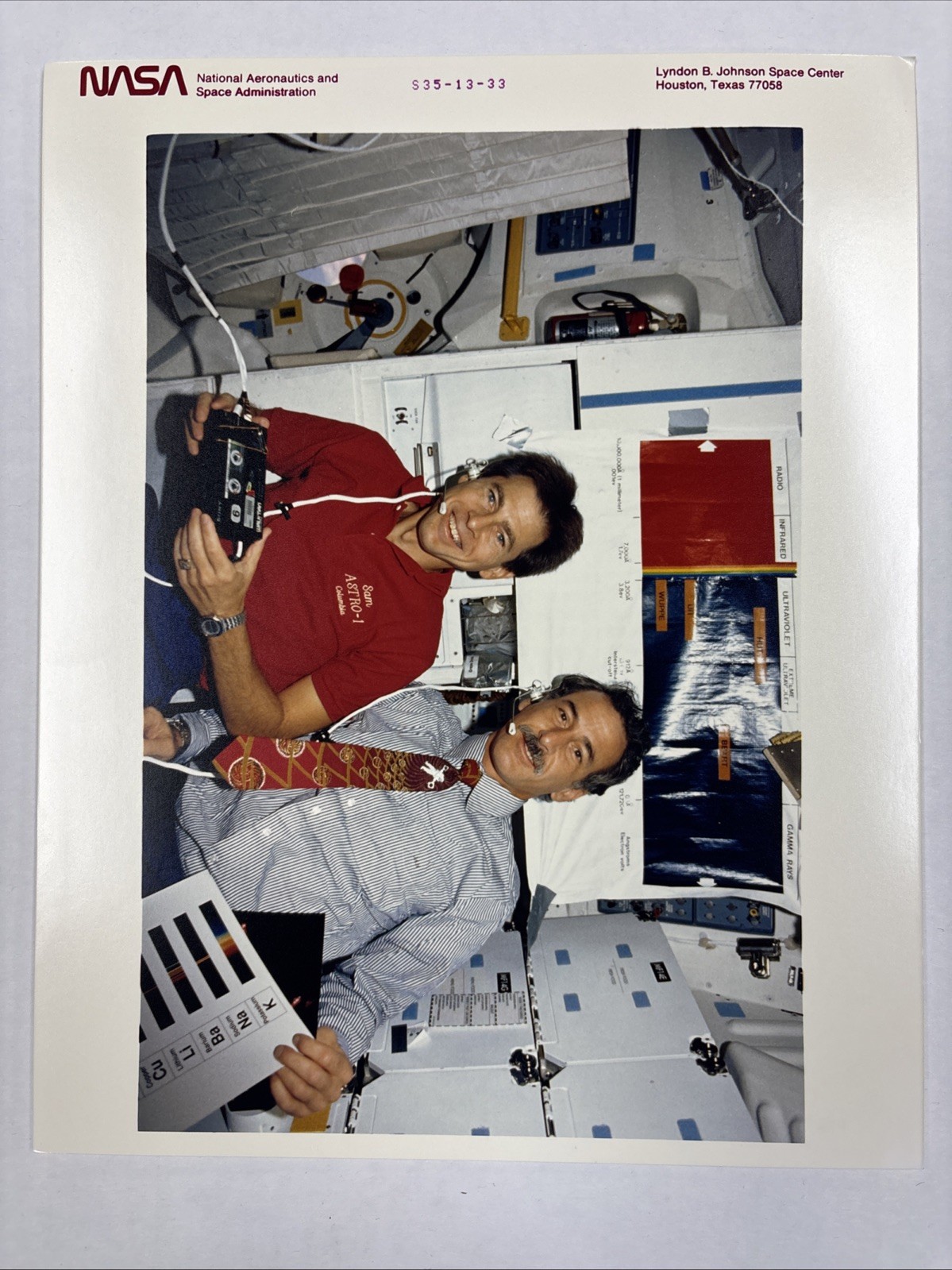 NASA STS 35 Durrance and Hoffman Give a Physics Briefing to Students Press Photo
