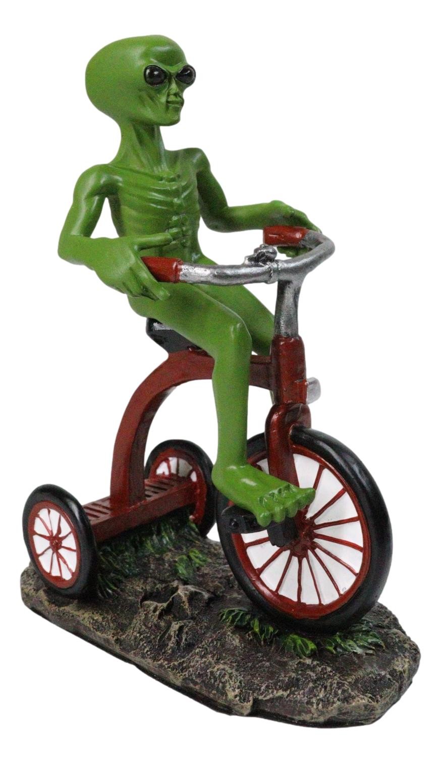 'Space Travel' UFO Green ET Roswell Alien Riding A Red Tricycle Figurine 6.75"H