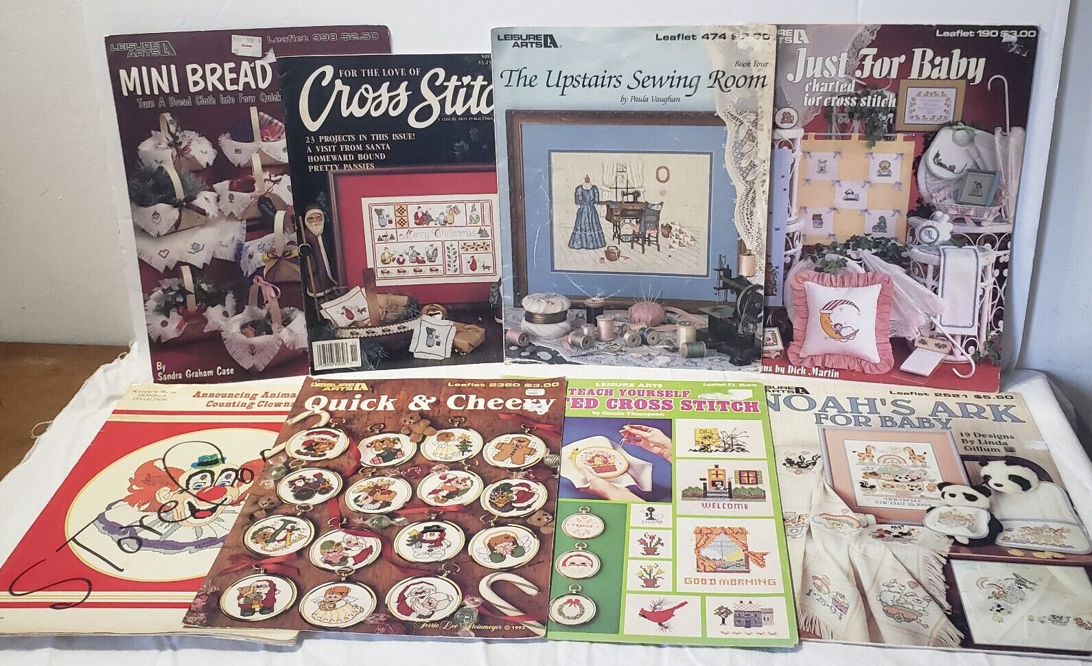 Lot of 8 Vintage Leisure Arts Cross Stitch Pattern Books- Sewing Room-Baby-bread