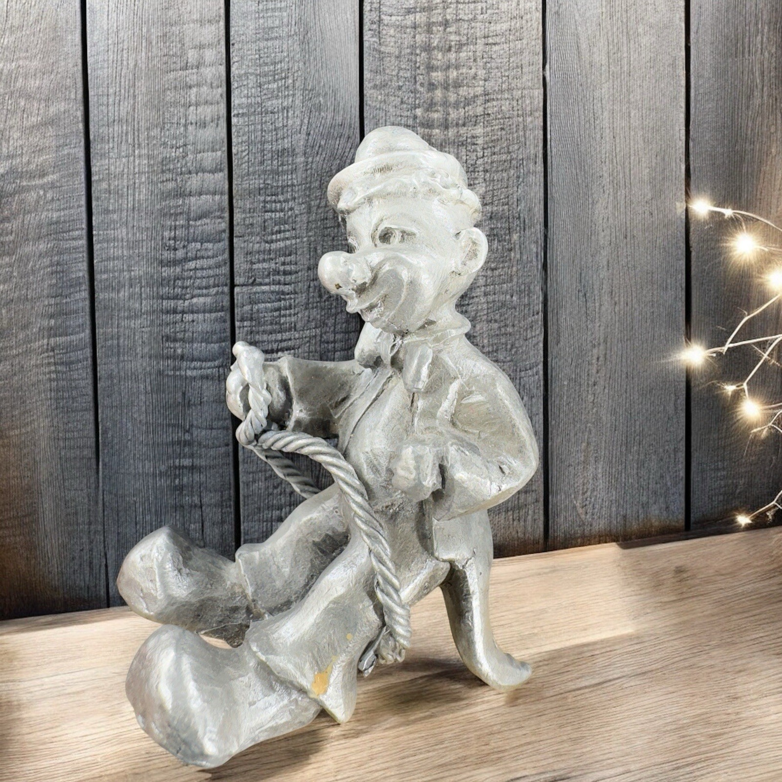 Vintage Pewder Small Clown Metal Figurine Holding A Rope Marked On Bottom Decor