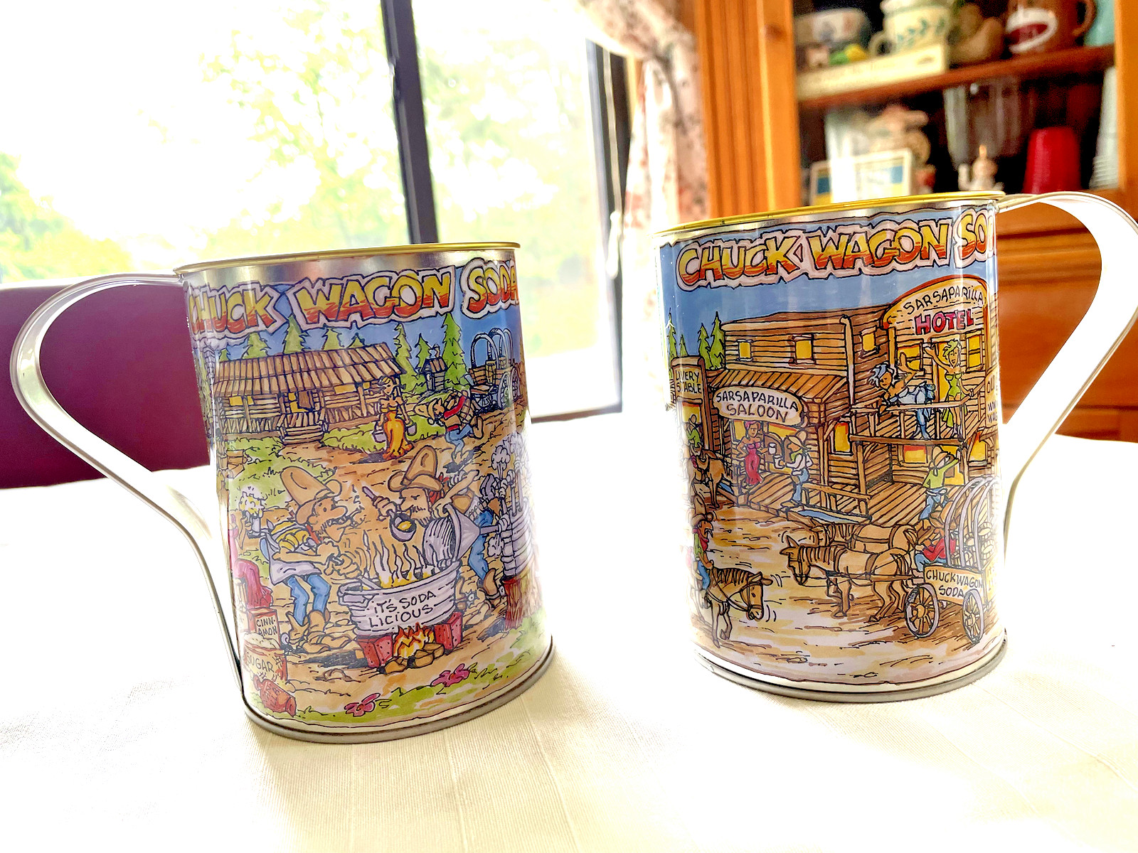 Pair of Chuck Wagon Soda Can Mugs (Metal) very colorful 5 1/2 "tall 4" wide