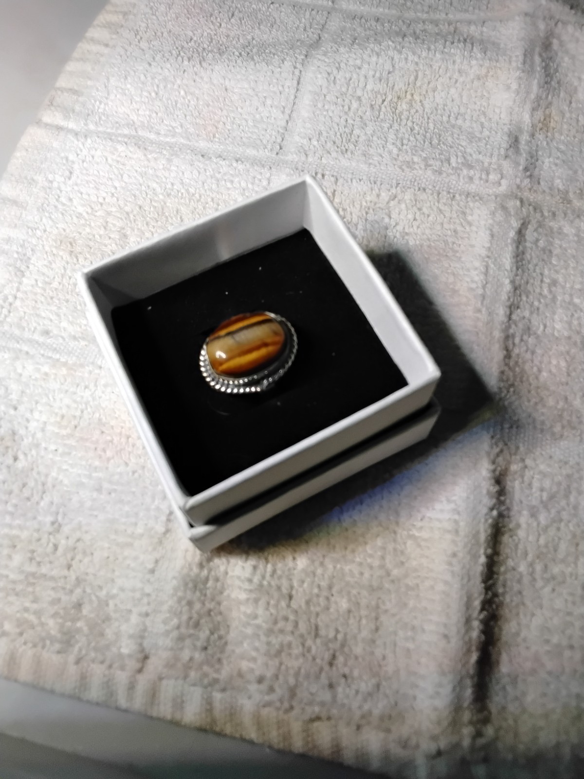 Tiger's Eye Oval Ring Bezel Set In Rhodium Plated Setting. Size 7