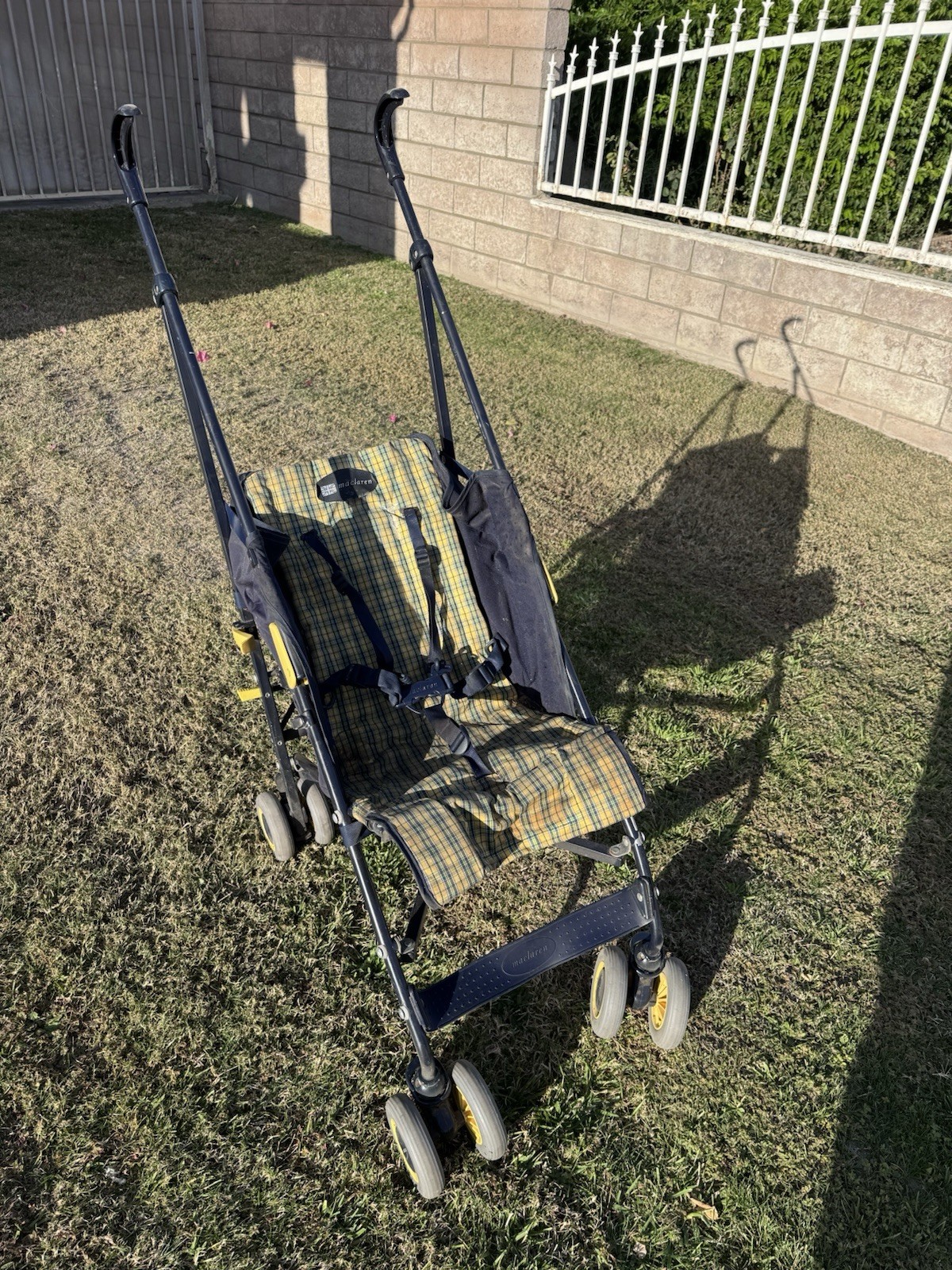 vintage yellow and blue plaid Maclaren umbrella stroller