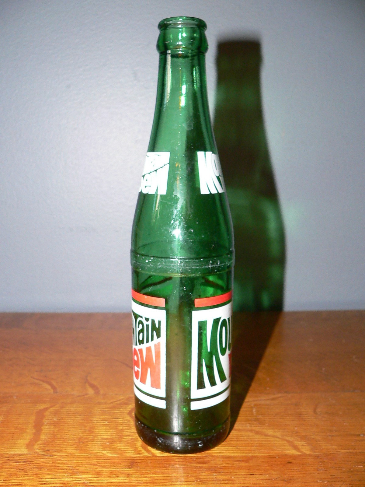 Vintage Mountain Dew Empty 10 oz Bottle with Red & White Classic Logo