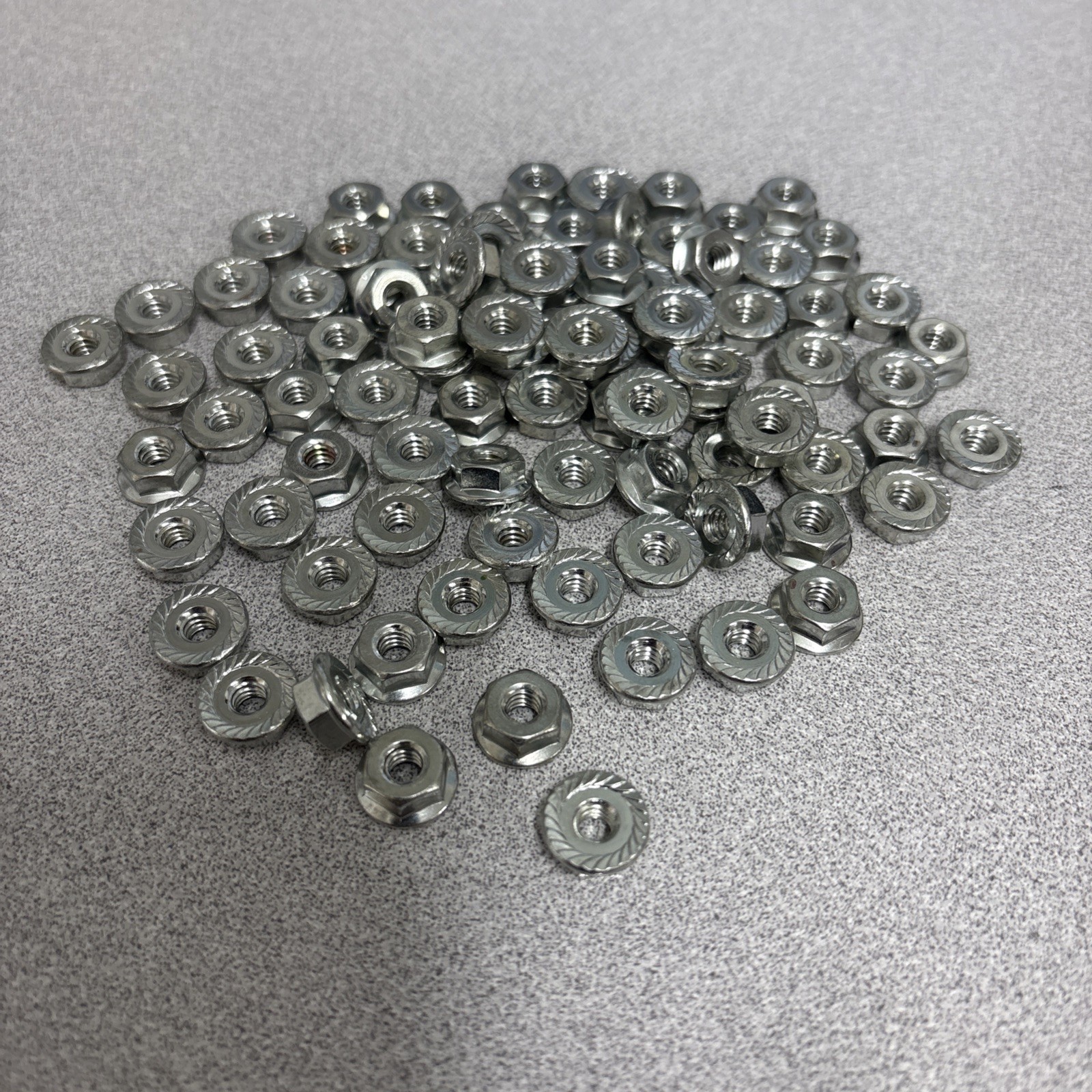 10-24 Serrated Flange Nuts- Steel Zinc Plated- Lot of 100