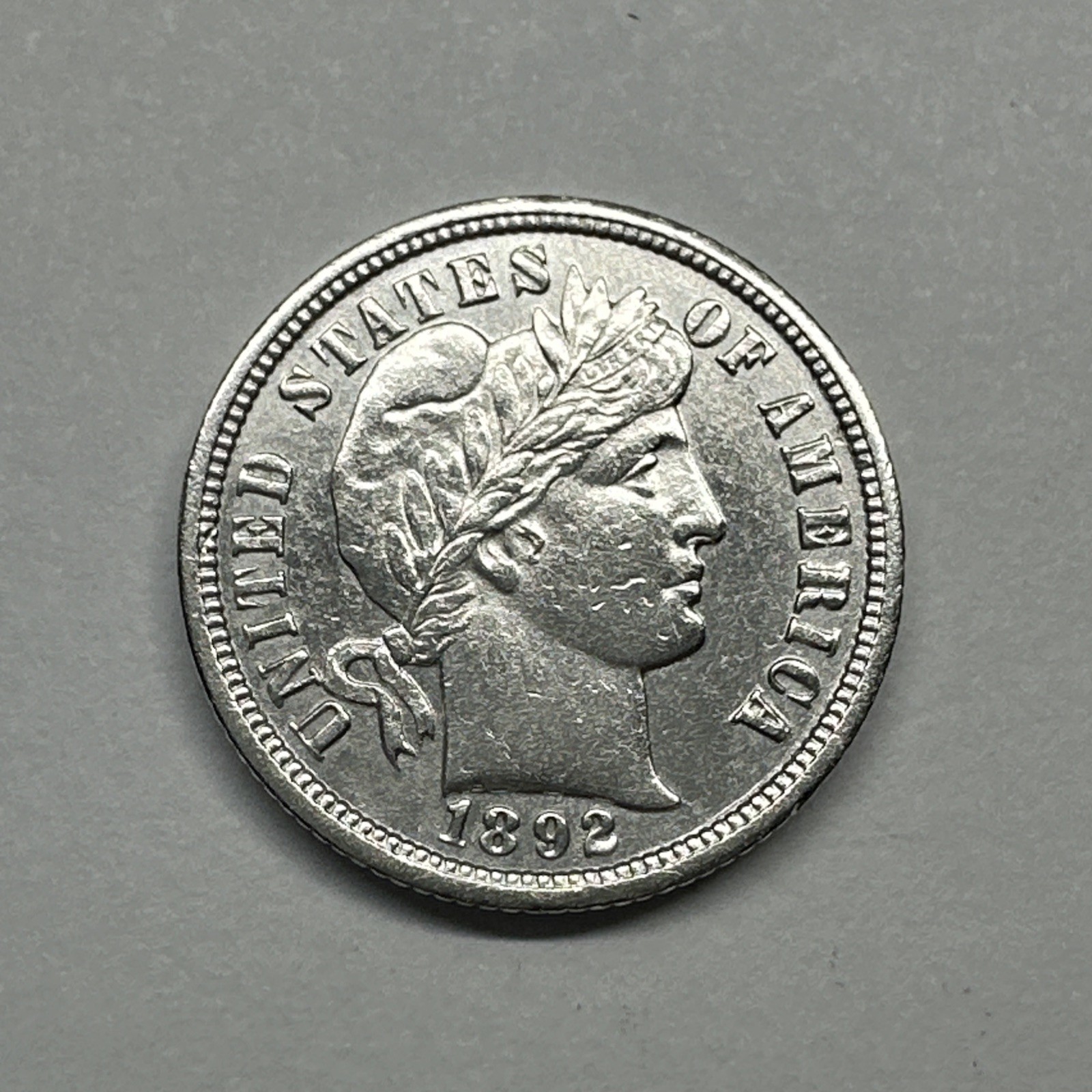 1892–O Barber Dime AU 213209