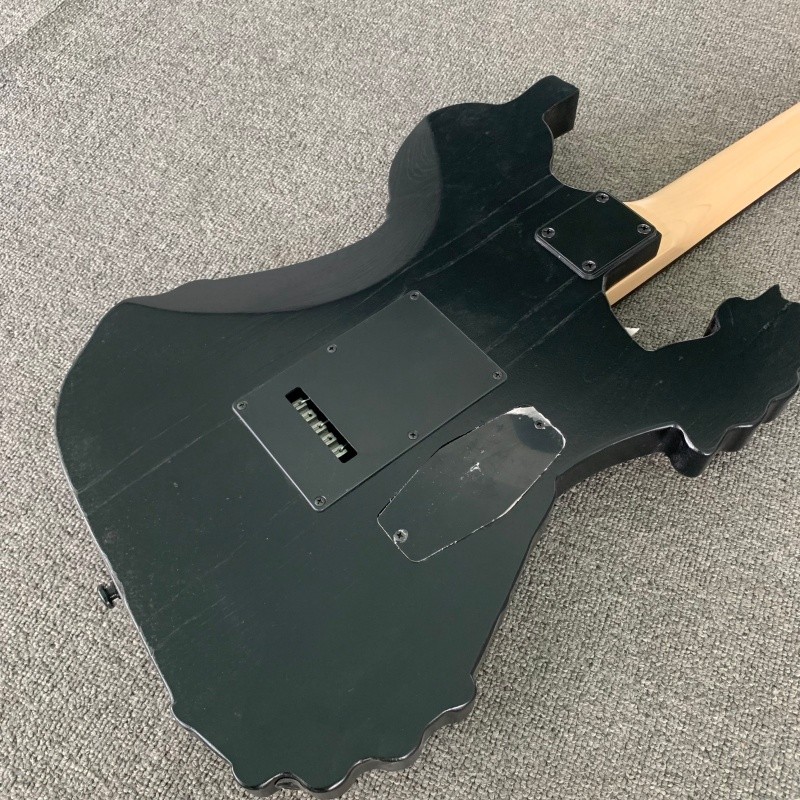Left Hand Skull Solid Electric Guitar Rounded Fret Edge Maple Neck Hard Rock