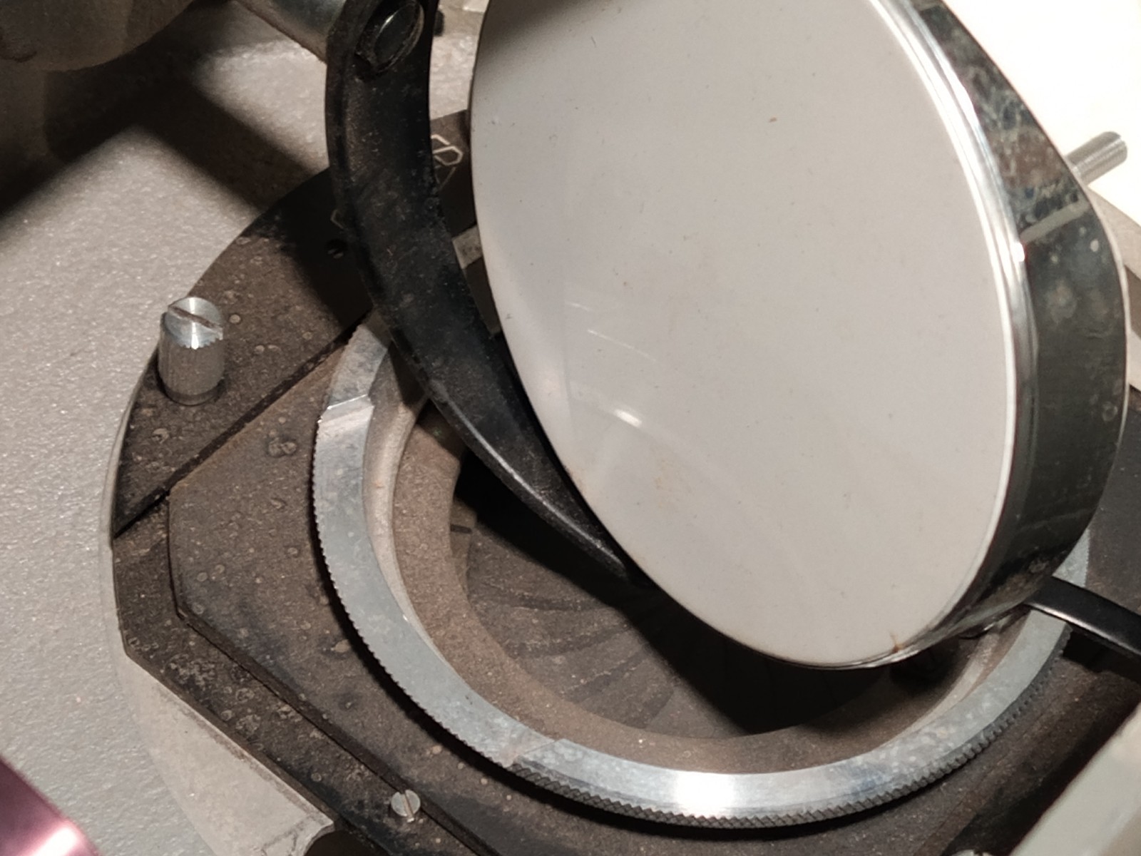 Olympus Tokyo microscope base w/ iris diaphragm, rotating stage, mirror shown