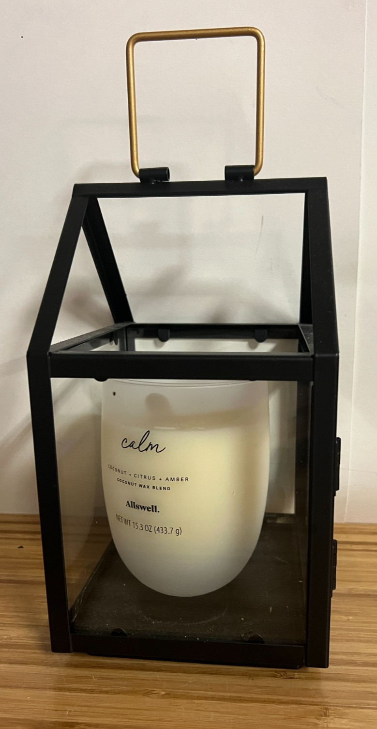black metal house shaped lantern w/ unused Allswell 15.3 oz Calm candle