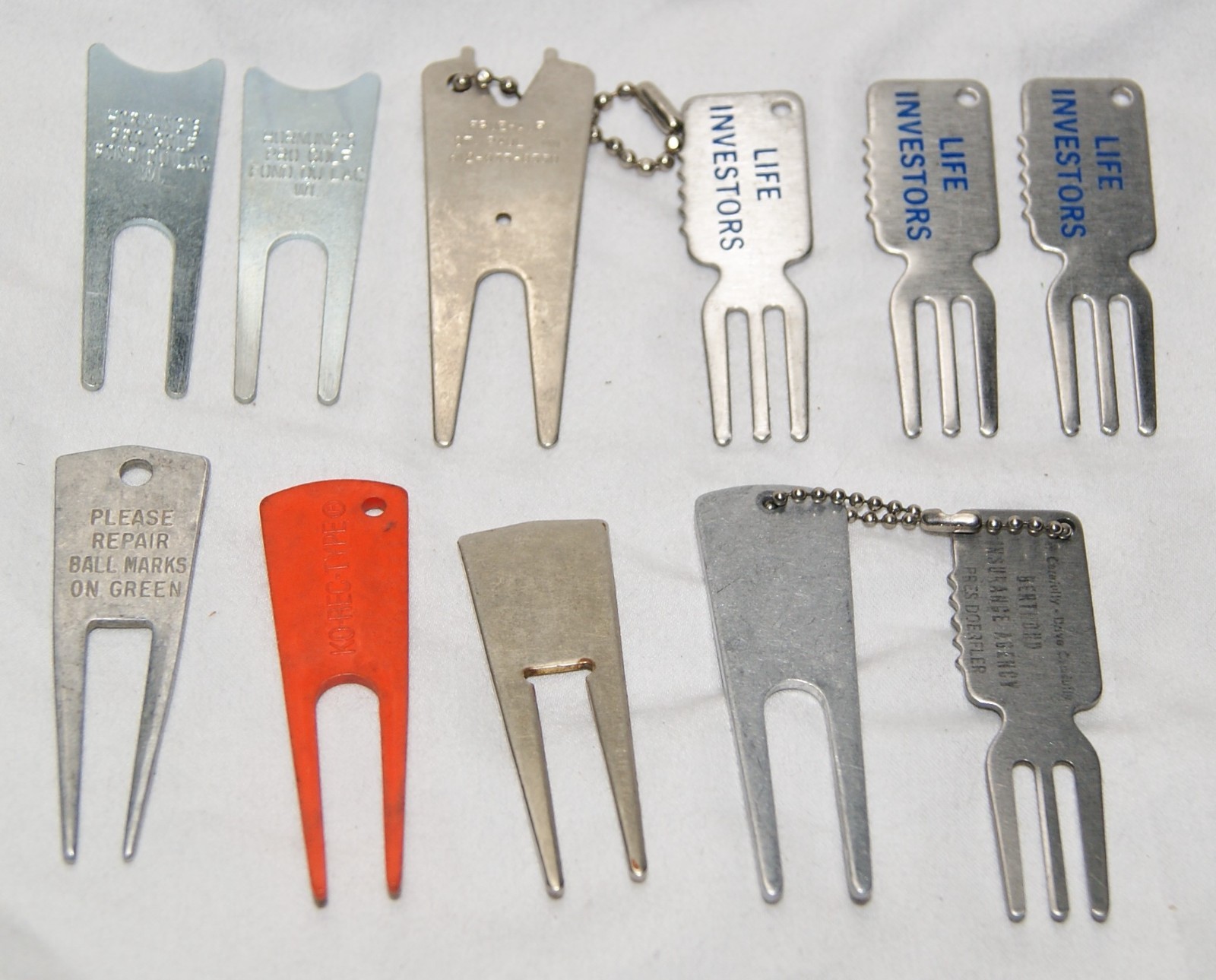 lot of 11 vintage golf divot repair tool