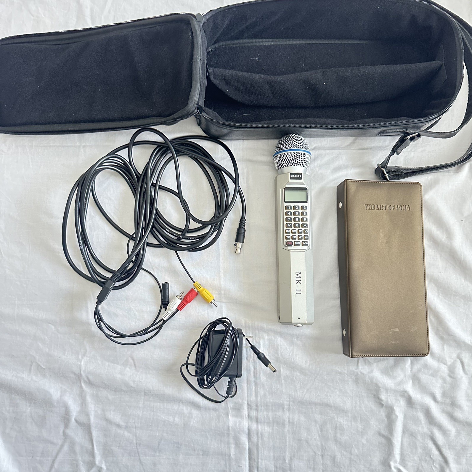 Magic Sing HandHeld Karaoke/Videoke Microphone Built-In Songs,list of song book