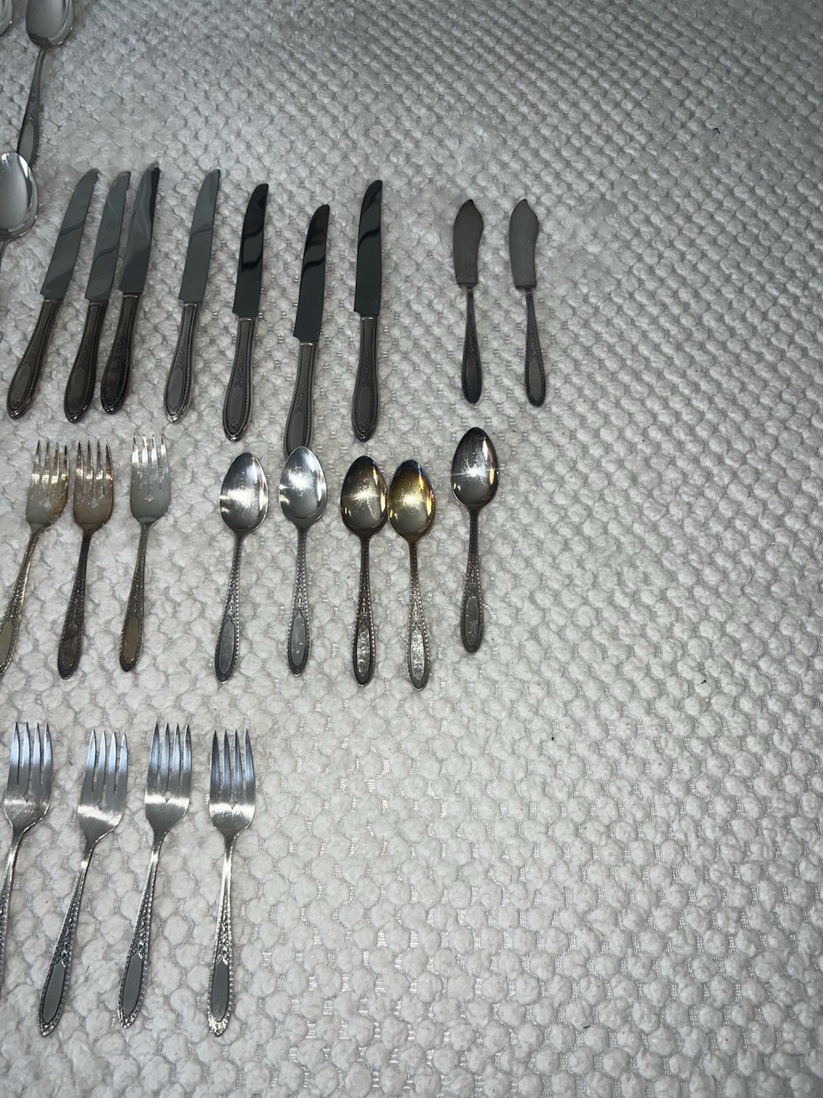 Wm. Rogers & Son or Oneida silver-plated flatware set