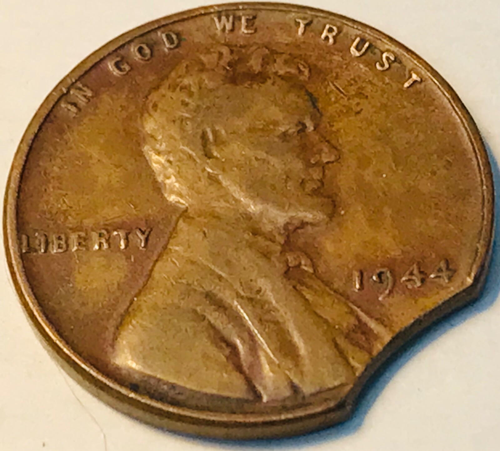 1944 Lincoln Wheat cent with curved clip