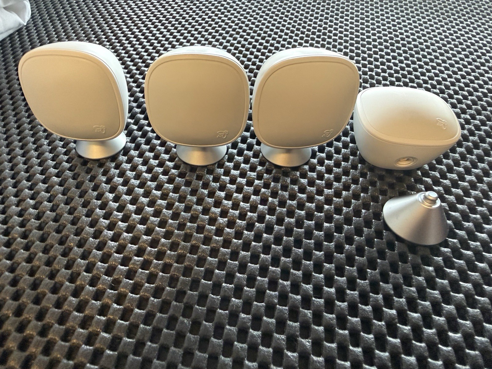 Ecobee SmartSensor Room Temperature Sensors, White, with a stand.