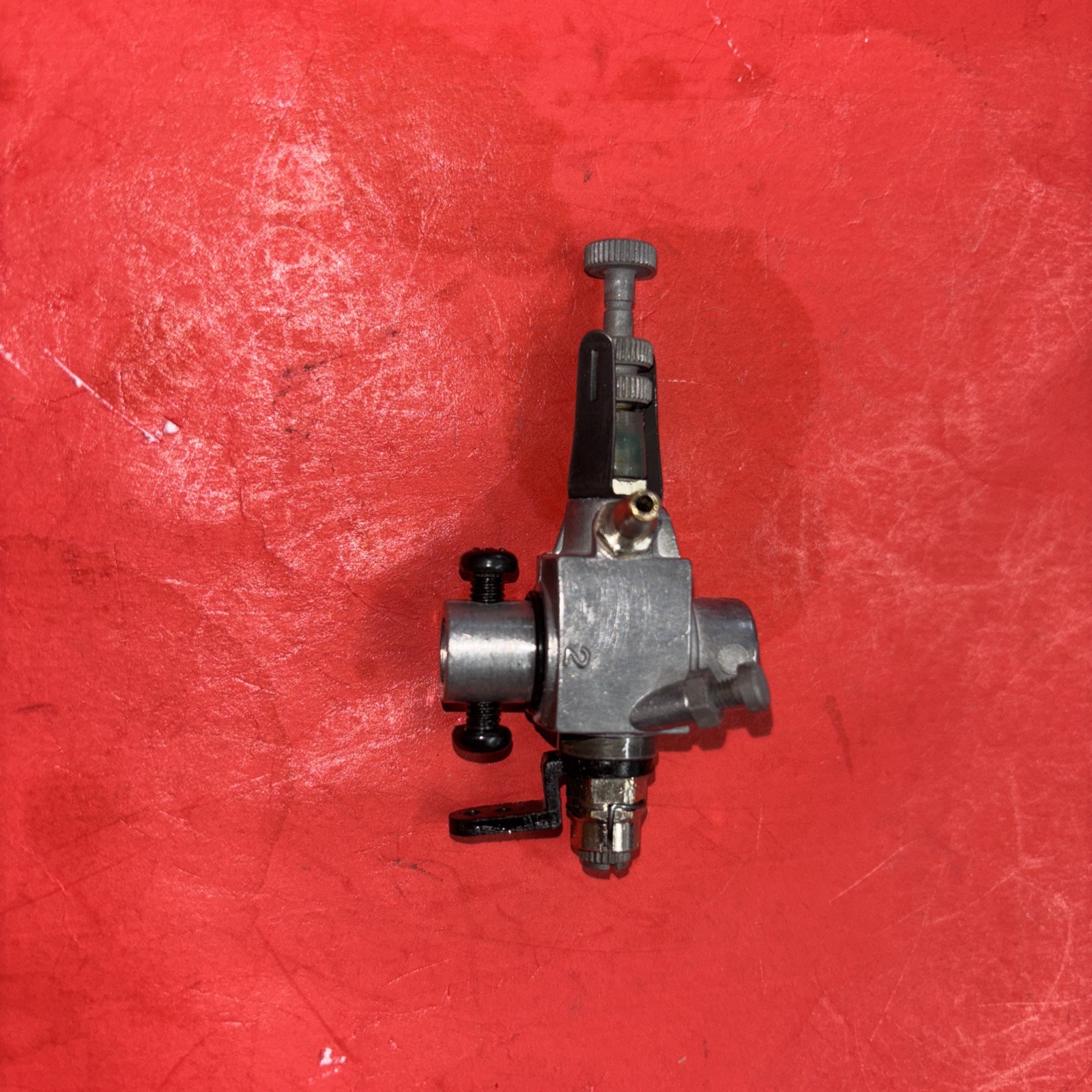 OS 25FSR 10MM R/C CARB ASSY TAKE OFFS MODEL 2B USED