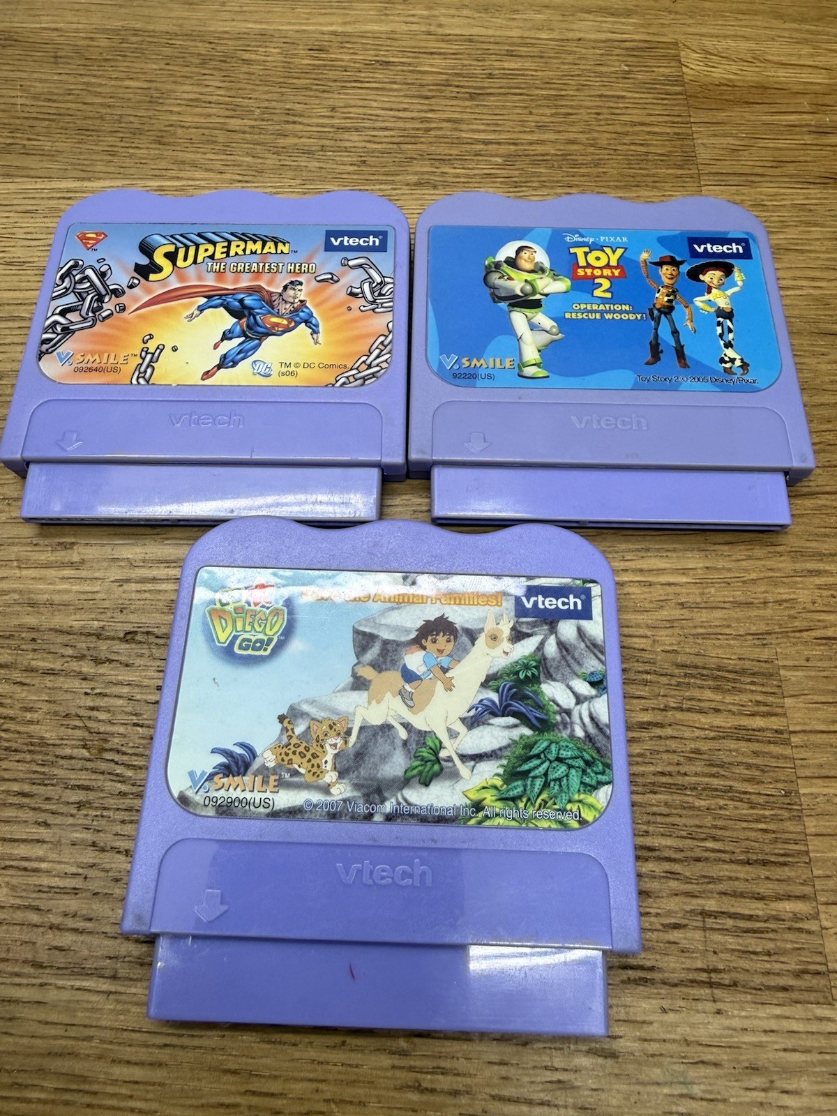 LOT 3x V Tech V Smile Games:   Toy Story 2, Go Diego Go & Superman