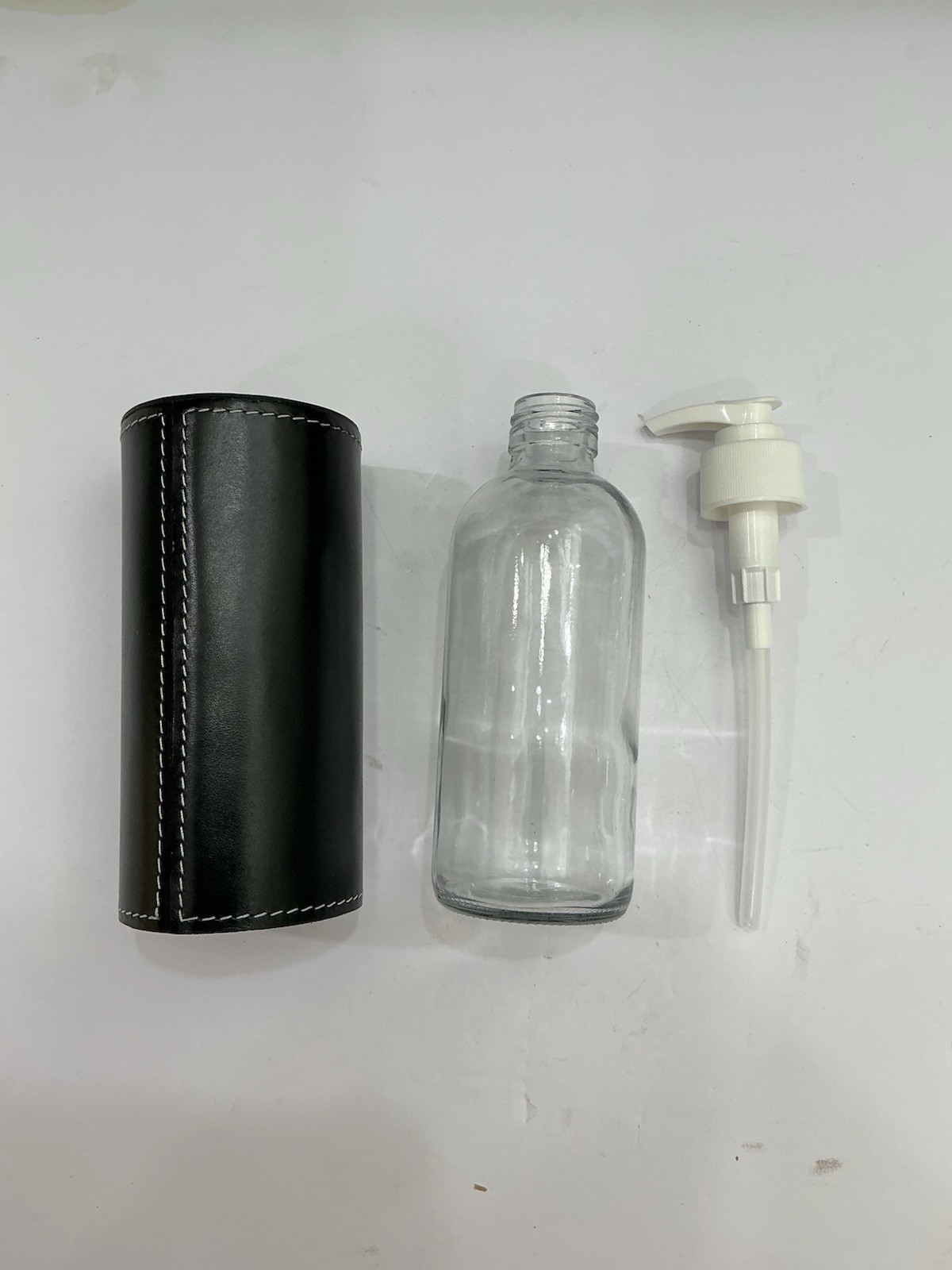 Black Leather Sleeve And Soap Dispenser